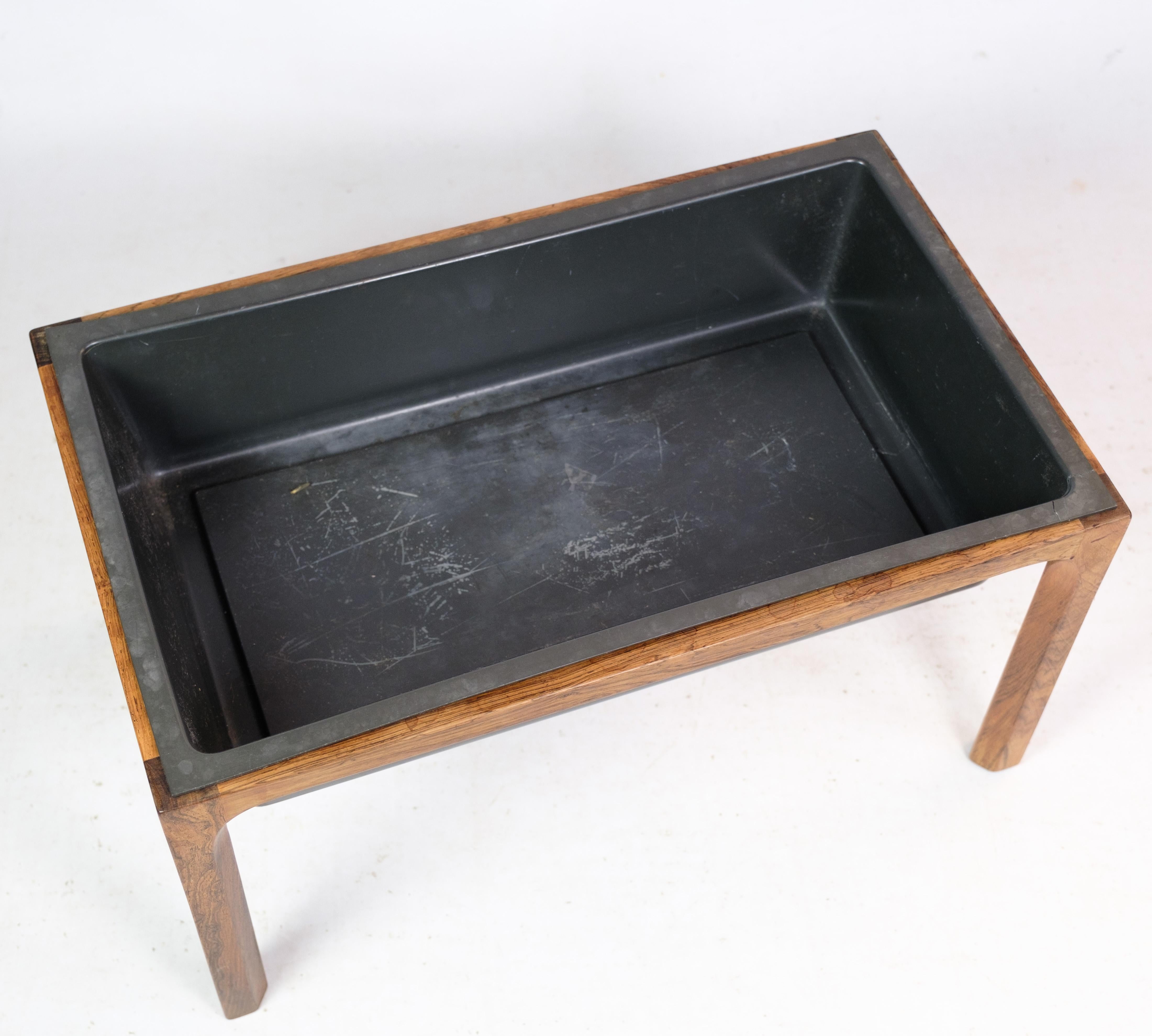 Plant box, designed by Kai Kristensen in rosewood of Danish design from around the 1960s.

This product will be inspected thoroughly at our professional workshop by our educated employees, who assure the product quality.