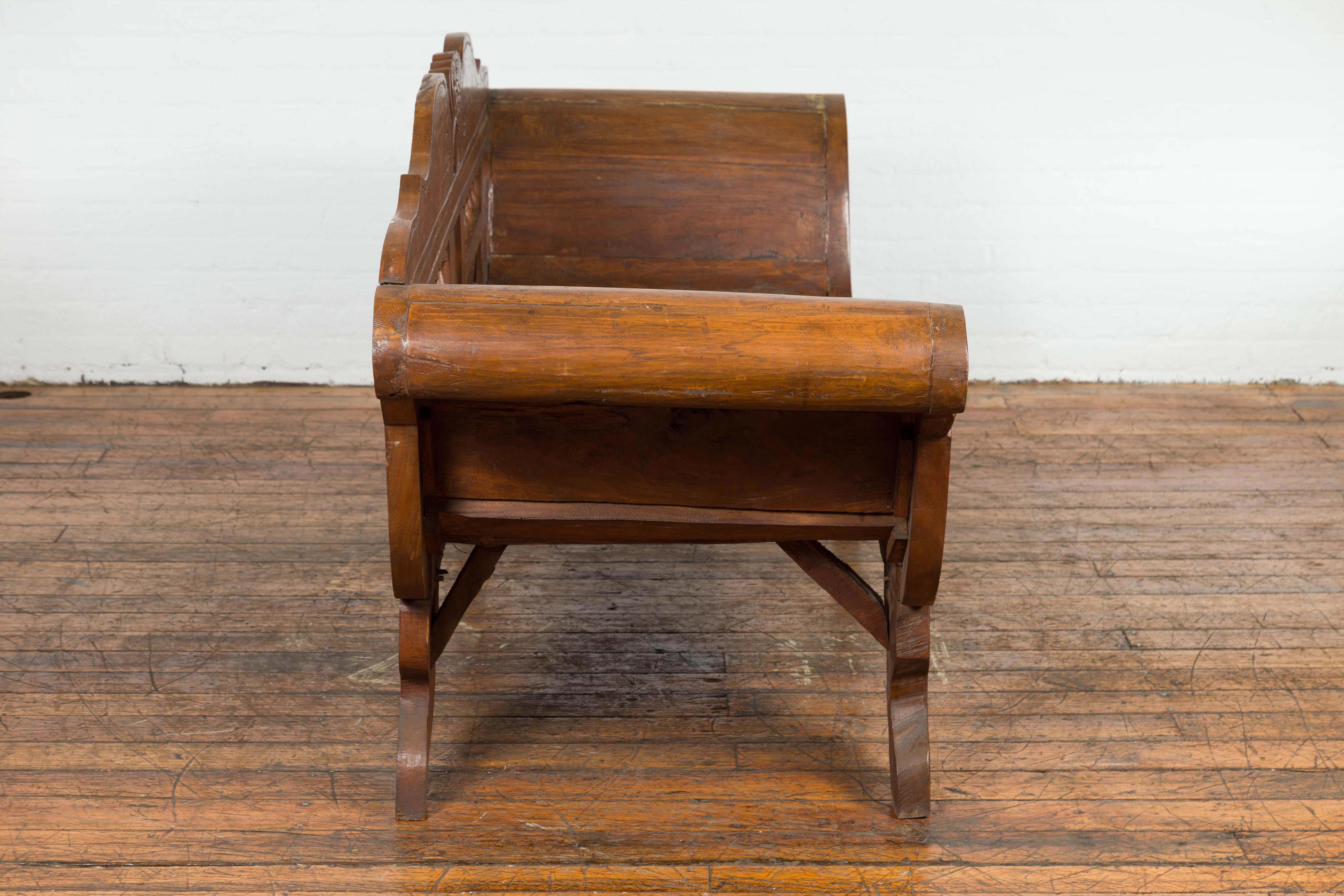 Javanese Teak Settee with Carved Décor and Out-Scrolling Arms For Sale 11