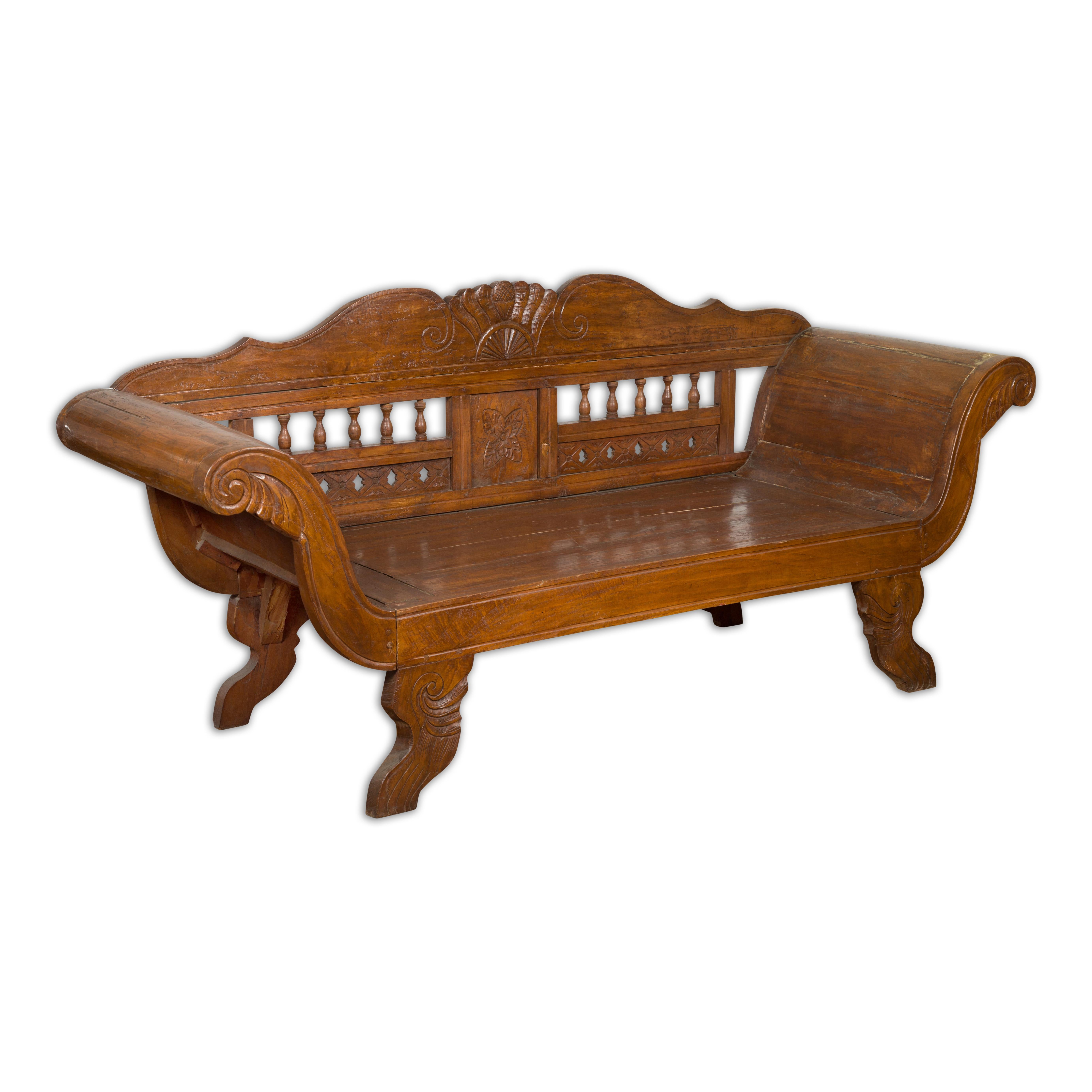 Javanese Teak Settee with Carved Décor and Out-Scrolling Arms For Sale 14