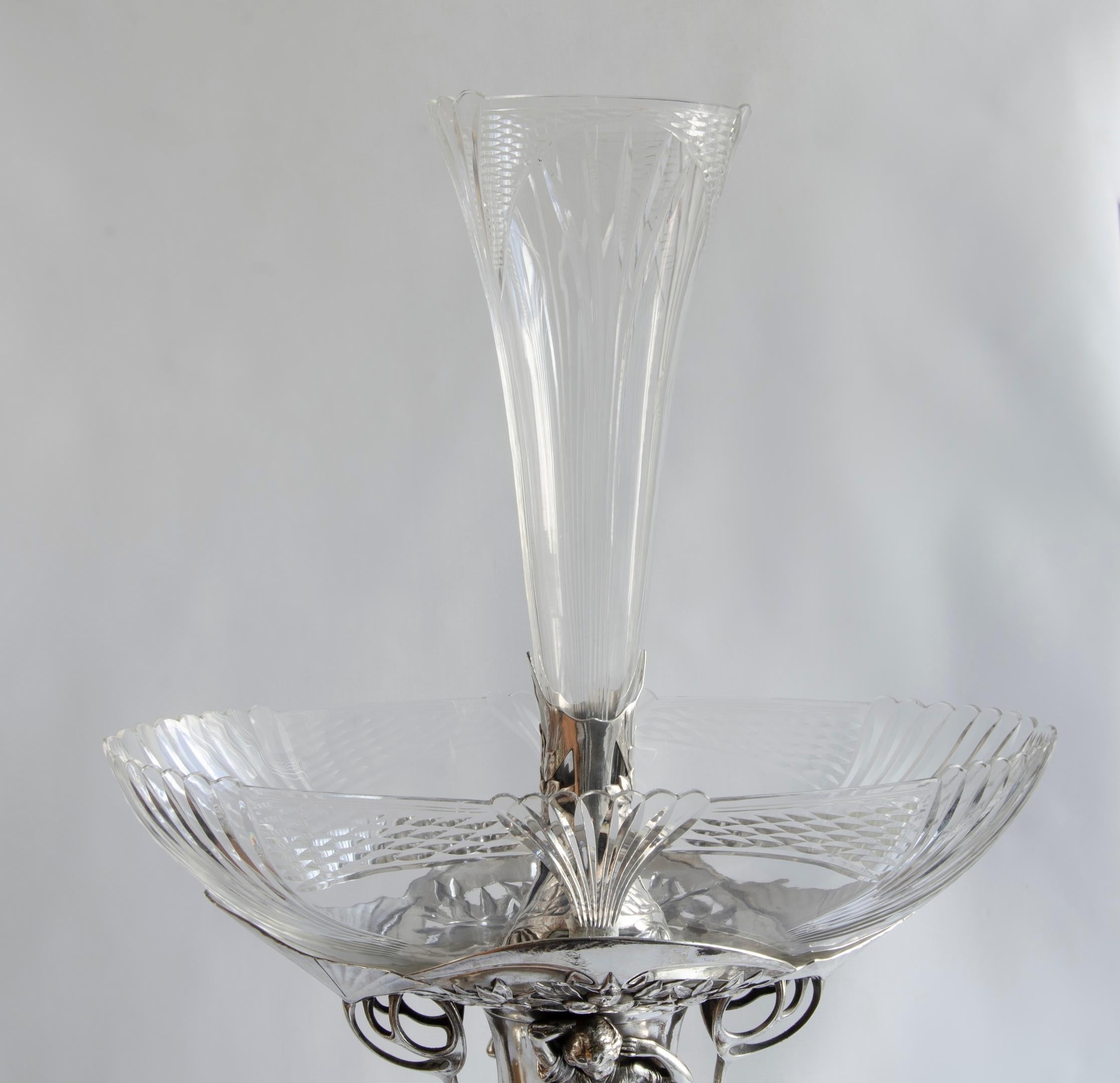 Planter origin Germany
attributed to WMF,
circa 1900
electro plated perfect condition
original glasses
silver pewter
monumental size.
Art nouveau, modernist art or modernism was an international artistic and decorative movement, developed between