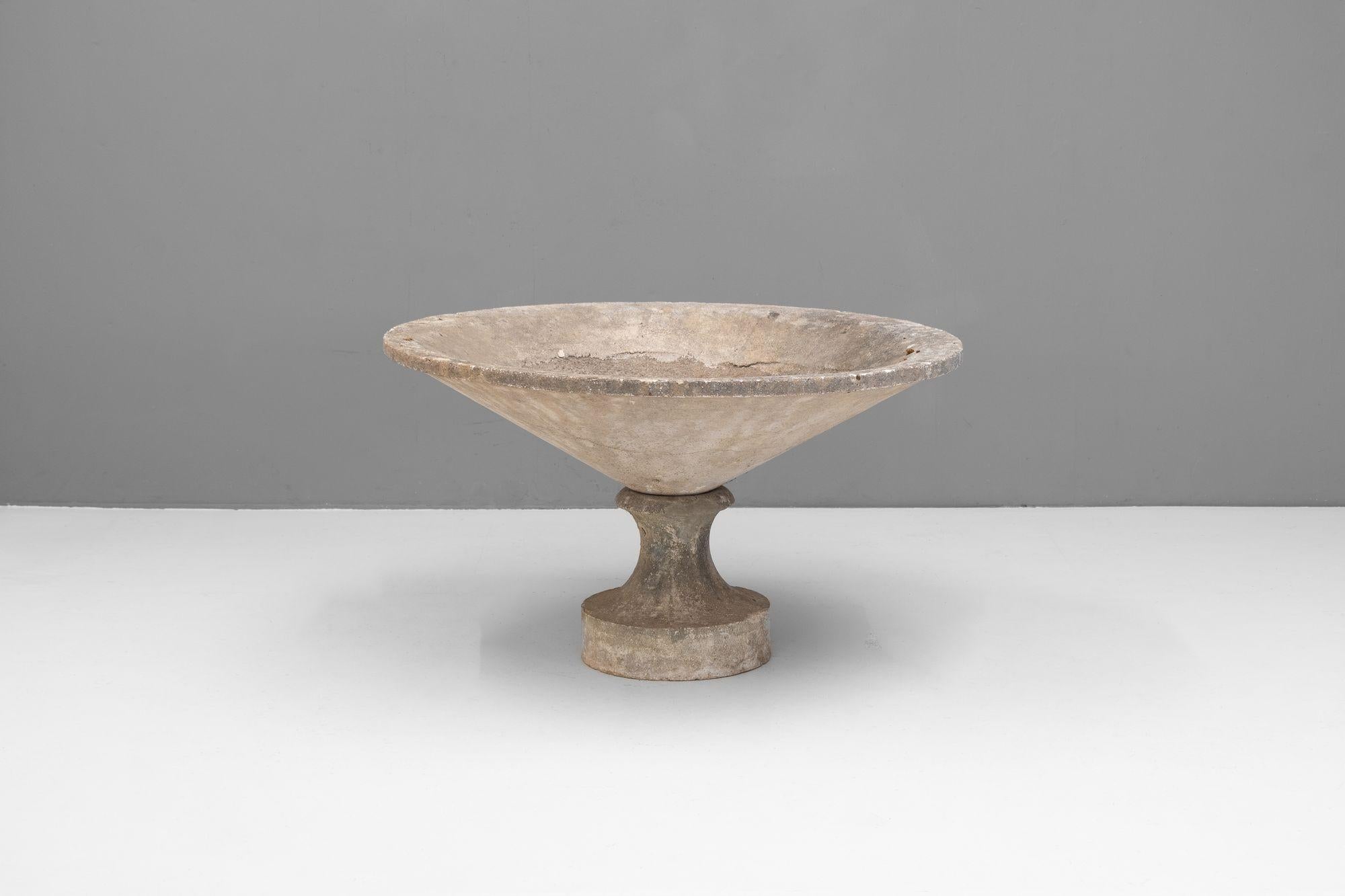 Large concrete dish planter on stand. France circa 1960.
H 58cm x W 100cm x D 100cm
Please be in touch for an accurate shipping quote.