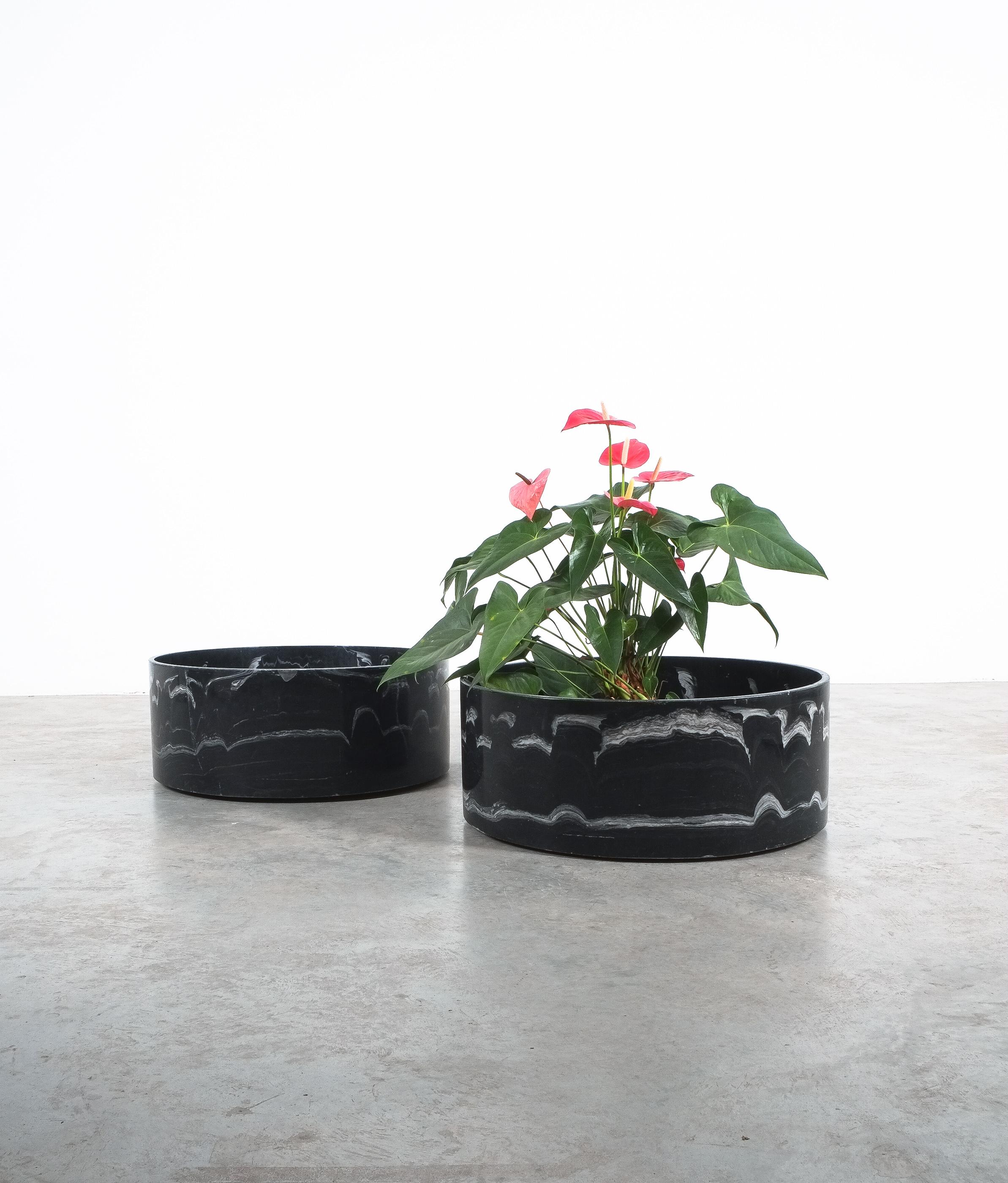Rare and large black cast marble planters (2)- sold per piece
We have the same pieces in white cast marble (2), a total of 4 planter, two of each, black + white, all sold and priced per piece

Stunning 27