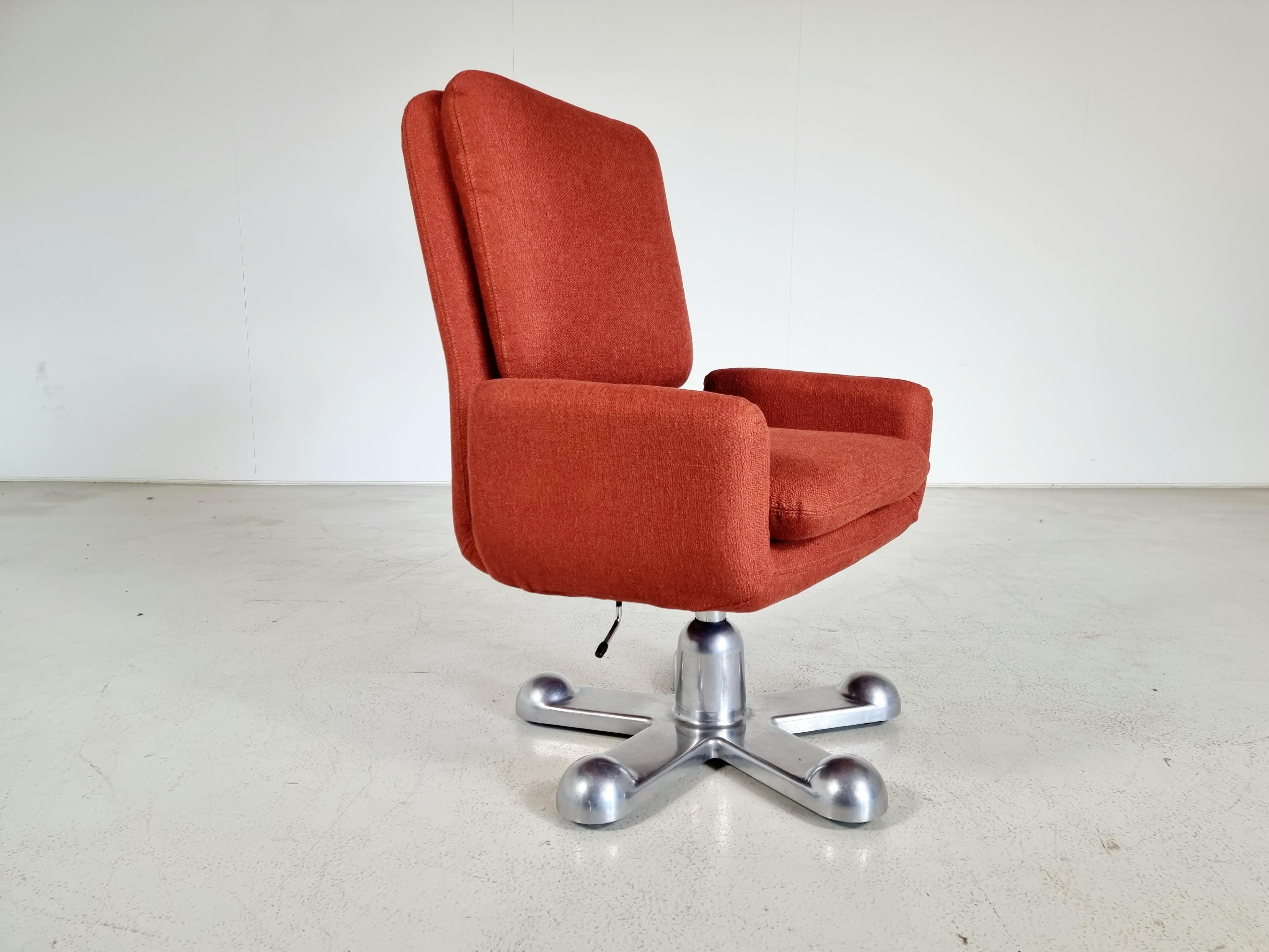 Perry King and Santiago Miranda for Planula, attributed to Ettore Sottsass, Italy, 1970s.

Stunning swivel and reclinable large desk chair. The seat shows clean lines with a tilted backrest and armrests that are only connected to the seat instead
