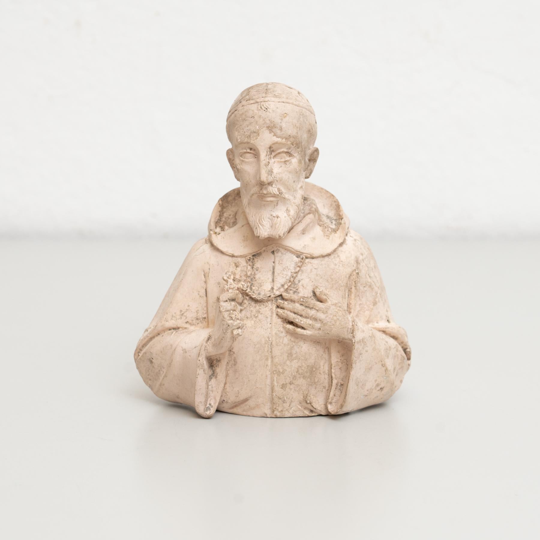 Traditional religious plaster figure of a saint.    Made in traditional Catalan atelier in Olot, Spain, circa 1950.    In original condition, with minor wear consistent with age and use, preserving a beautiful patina.    Materials:  Plaster.    