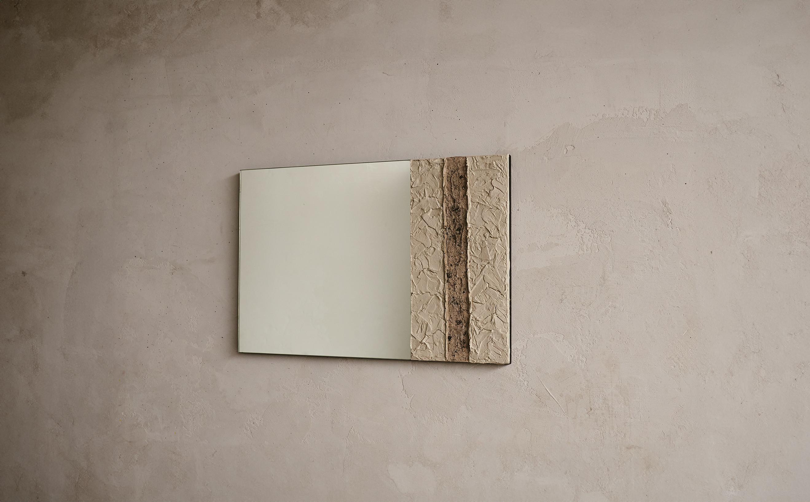 The Pompeii II Mirror consists of hand sculpted plaster and burnt ash that is hand-spread and worked.

*Burnt Ash shape and color is organic and may differ from piece to piece to keep uniqueness in the artists own hand and technique.