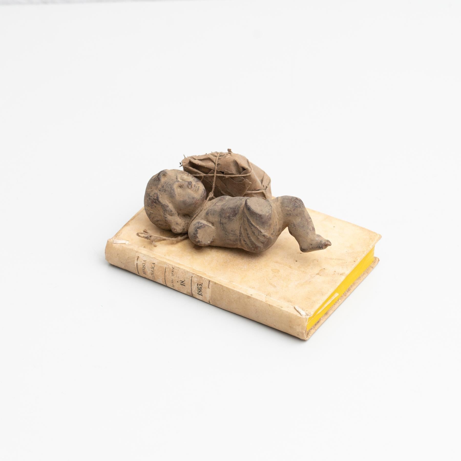 Modern Plaster Baby Jesus and Antique Book Sculptural Artwork, circa 1950 For Sale