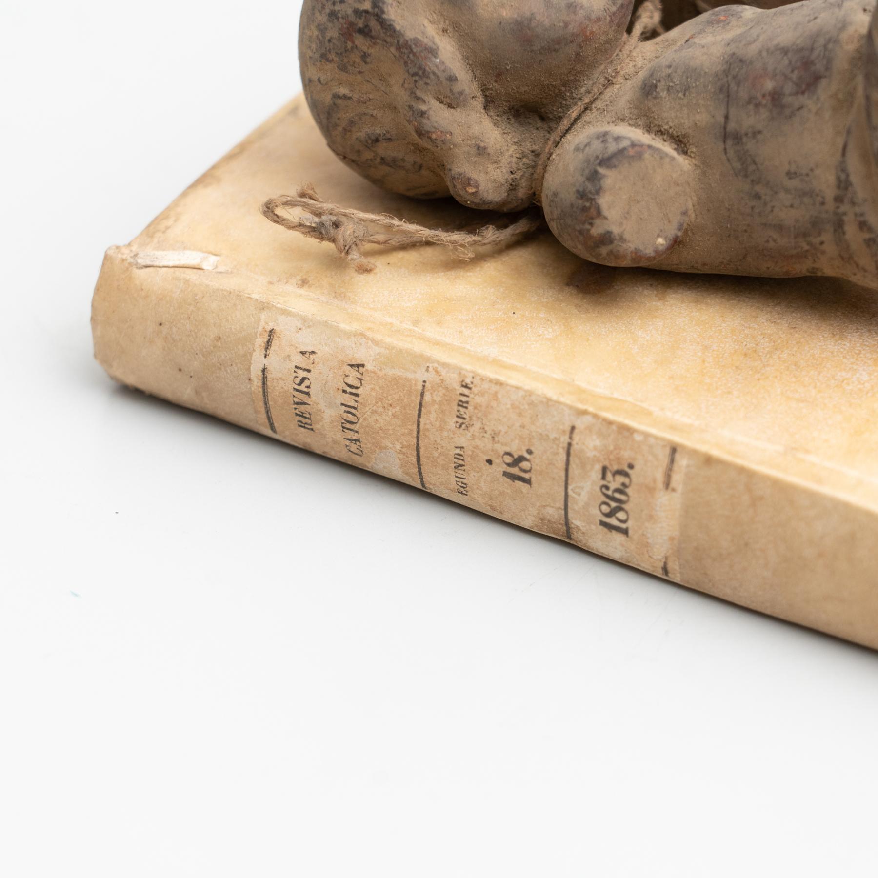 Plaster Baby Jesus and Antique Book Sculptural Artwork, circa 1950 In Good Condition For Sale In Barcelona, ES