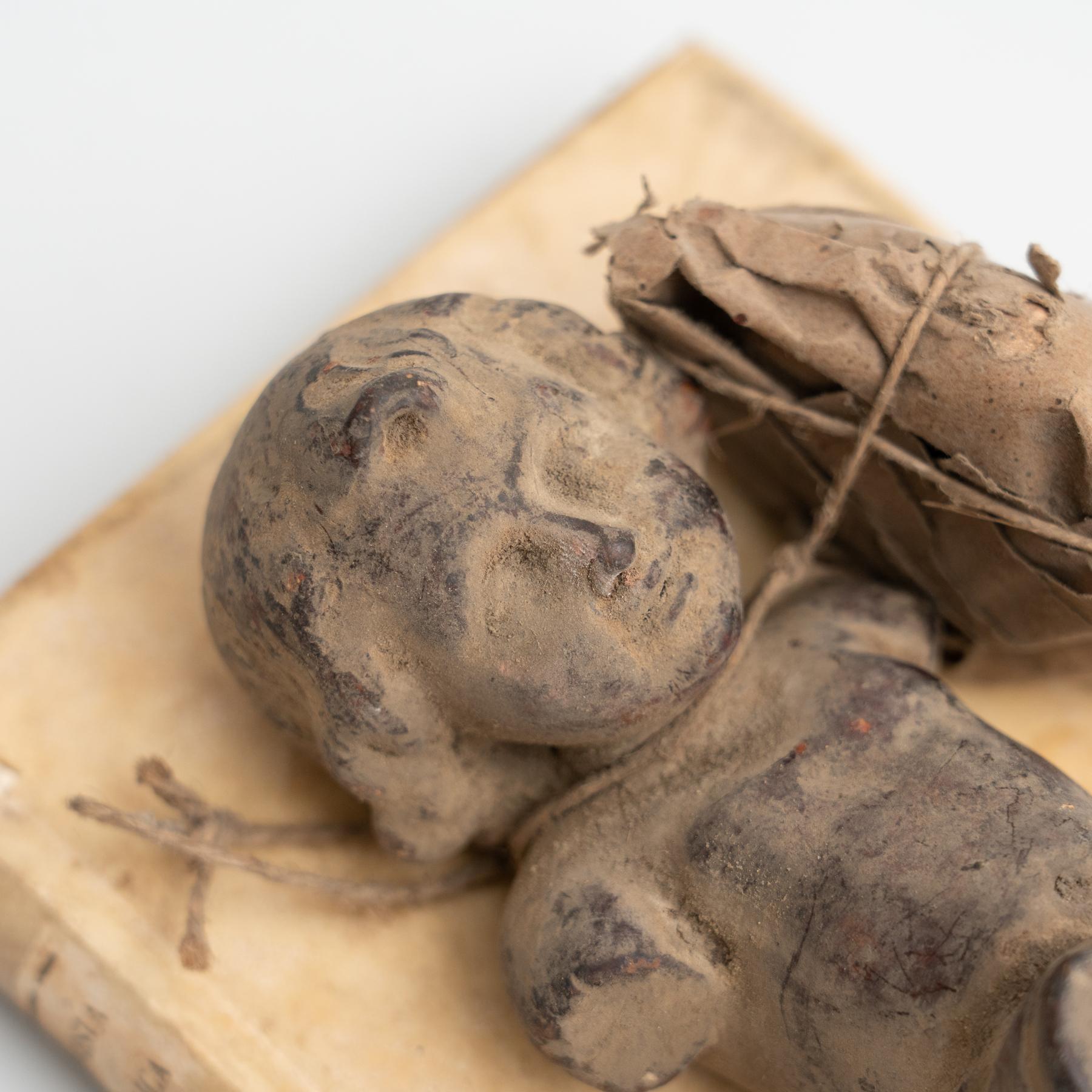 Mid-20th Century Plaster Baby Jesus and Antique Book Sculptural Artwork, circa 1950 For Sale