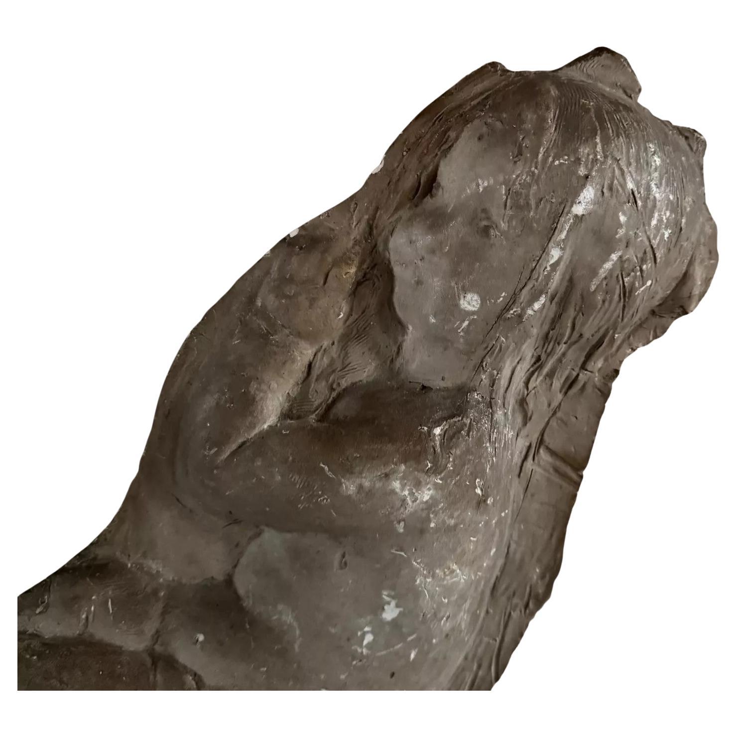 Plaster bas-relief of a baby, attributed to Charles Filleul.
