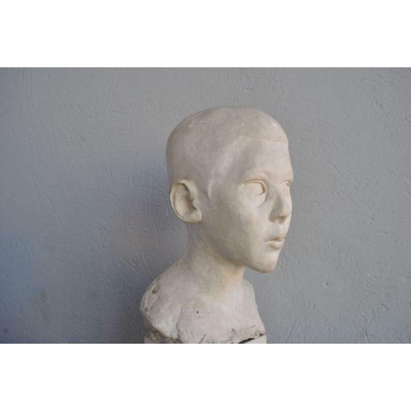 Child bust in plaster around 1900 unsigned but of remarkable quality. Dimensions height 69 cm.

Additional information:
Material: Patinated plaster