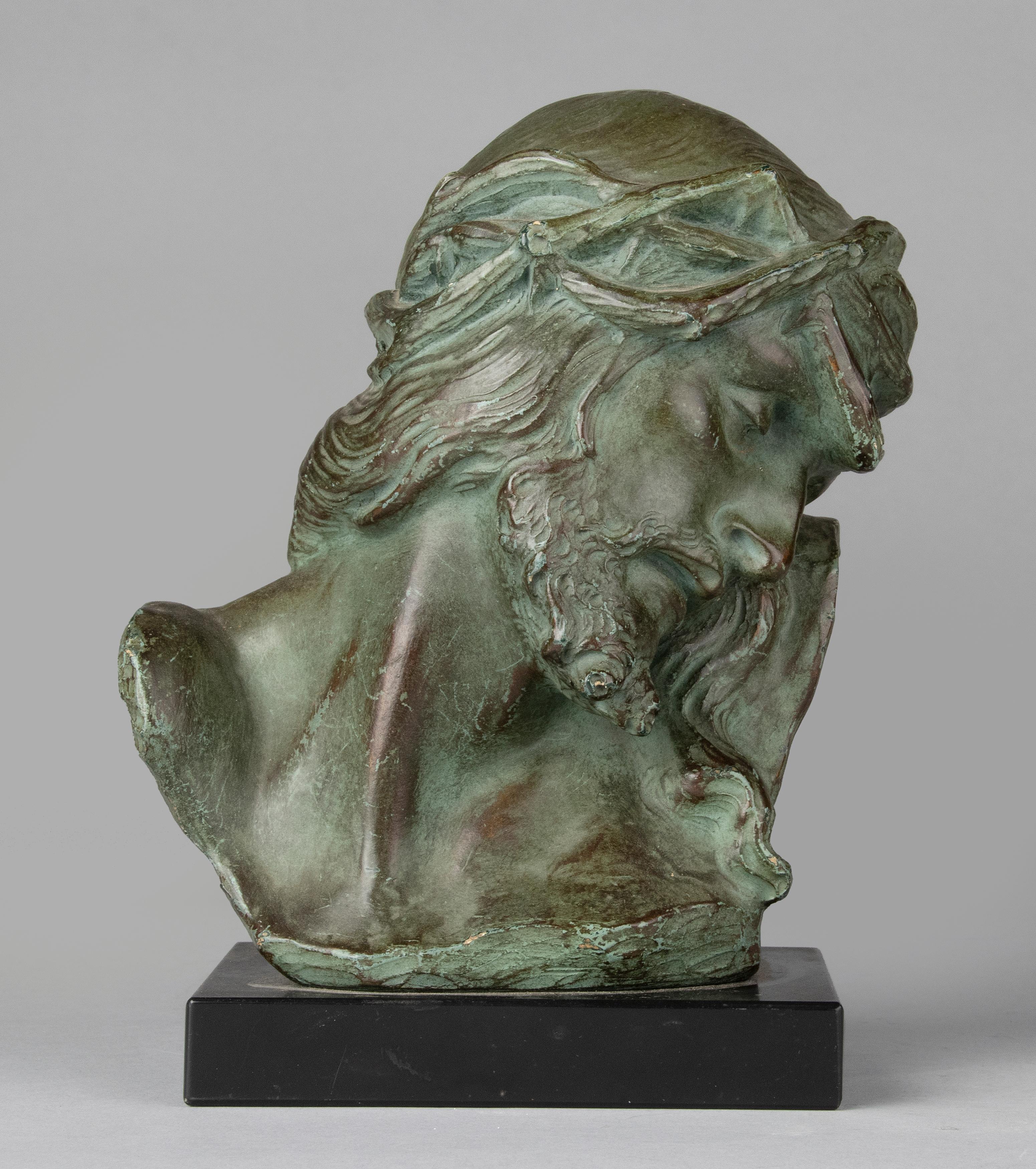 Beautiful old bust depicting Jesus Christ suffering. The statue is made of plaster, patinated in a green bronze color. The statue is fixed on a black marble base. The statue is marked on the back. Parentani is a well-known Belgian artist who was