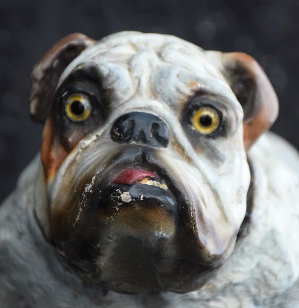 Handmade plaster English bull dog statue (Stamped), circa 1900.

Over the years this highly characteristic and decorative statue of an English bull dog must have belonged to many loving owners as its condition is so good for its age. This item is