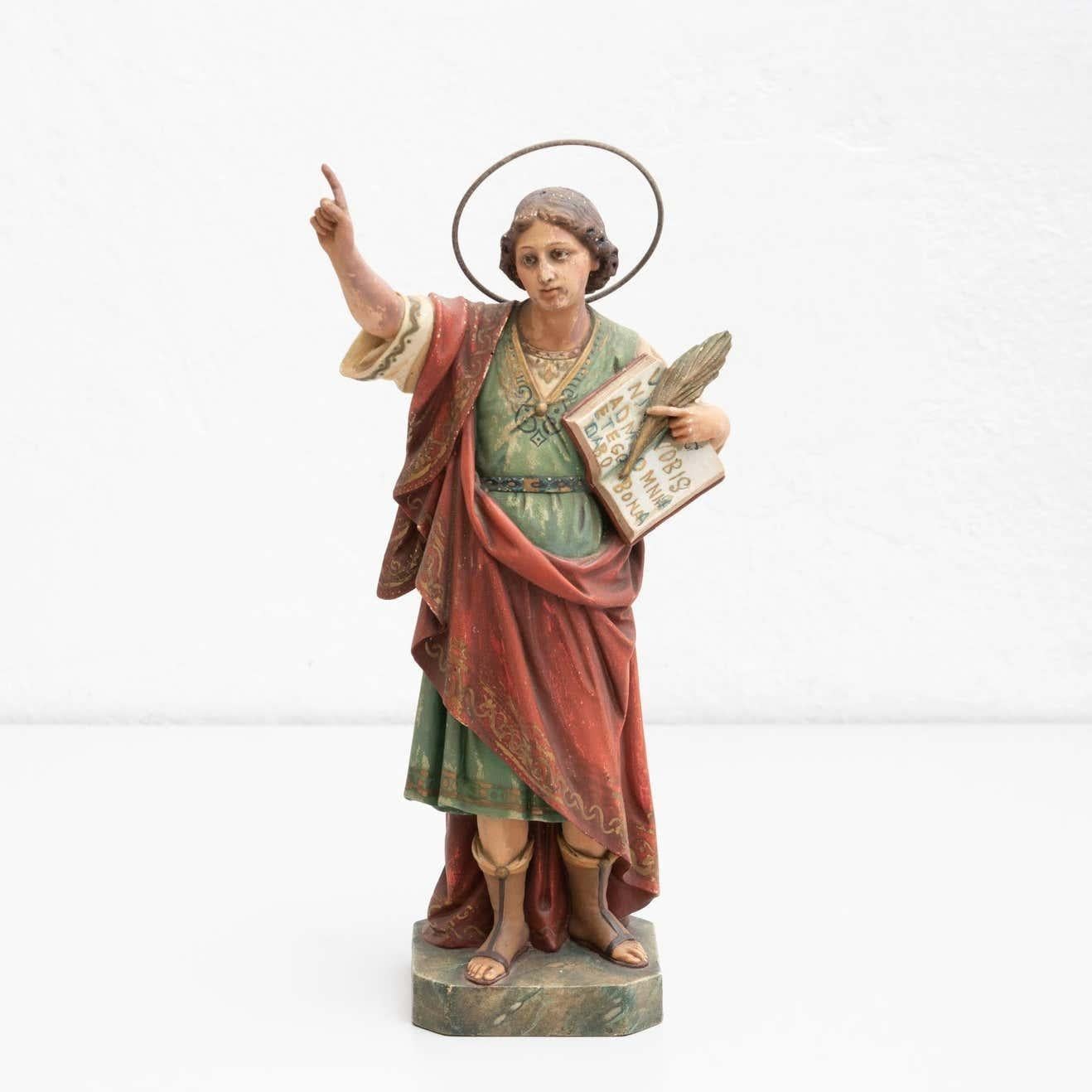 Traditional religious hand painted plaster figure of a Saint.    Originally stamped.    Made in traditional Catalan atelier in Olot, Spain, circa 1940.    Olot has a long tradition in the production of sculptures and religious imagery. The art and