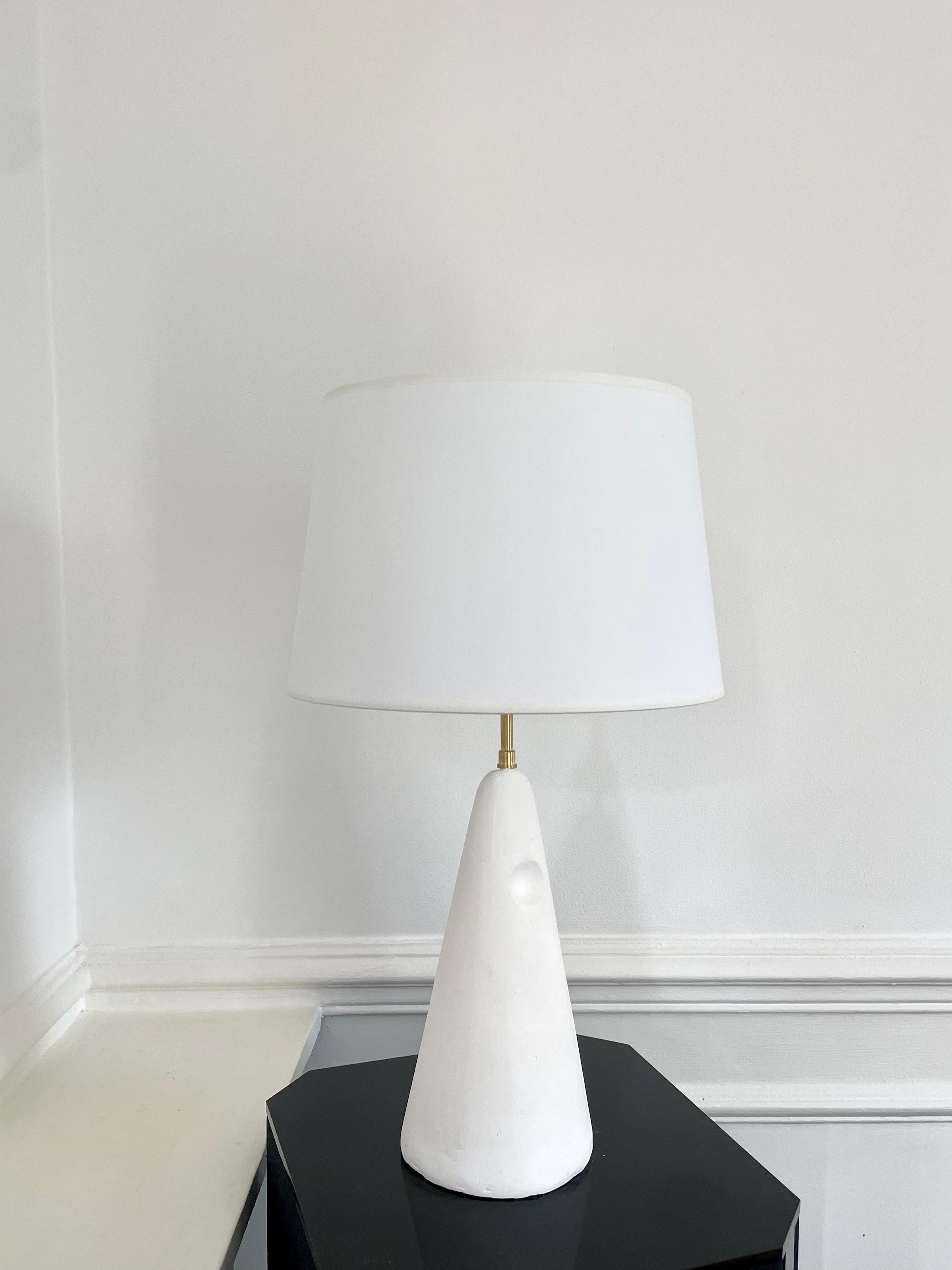Plaster Lamp Pietra by Renzo Maar
Dimensions:  D 13.5 x H 39 cm (without lampshade)
Materials: Plaster, Signed.

Made of plaster, this lamp is an abstract sculpture reminiscent of menhirs, those standing stones which are supposed to be the link