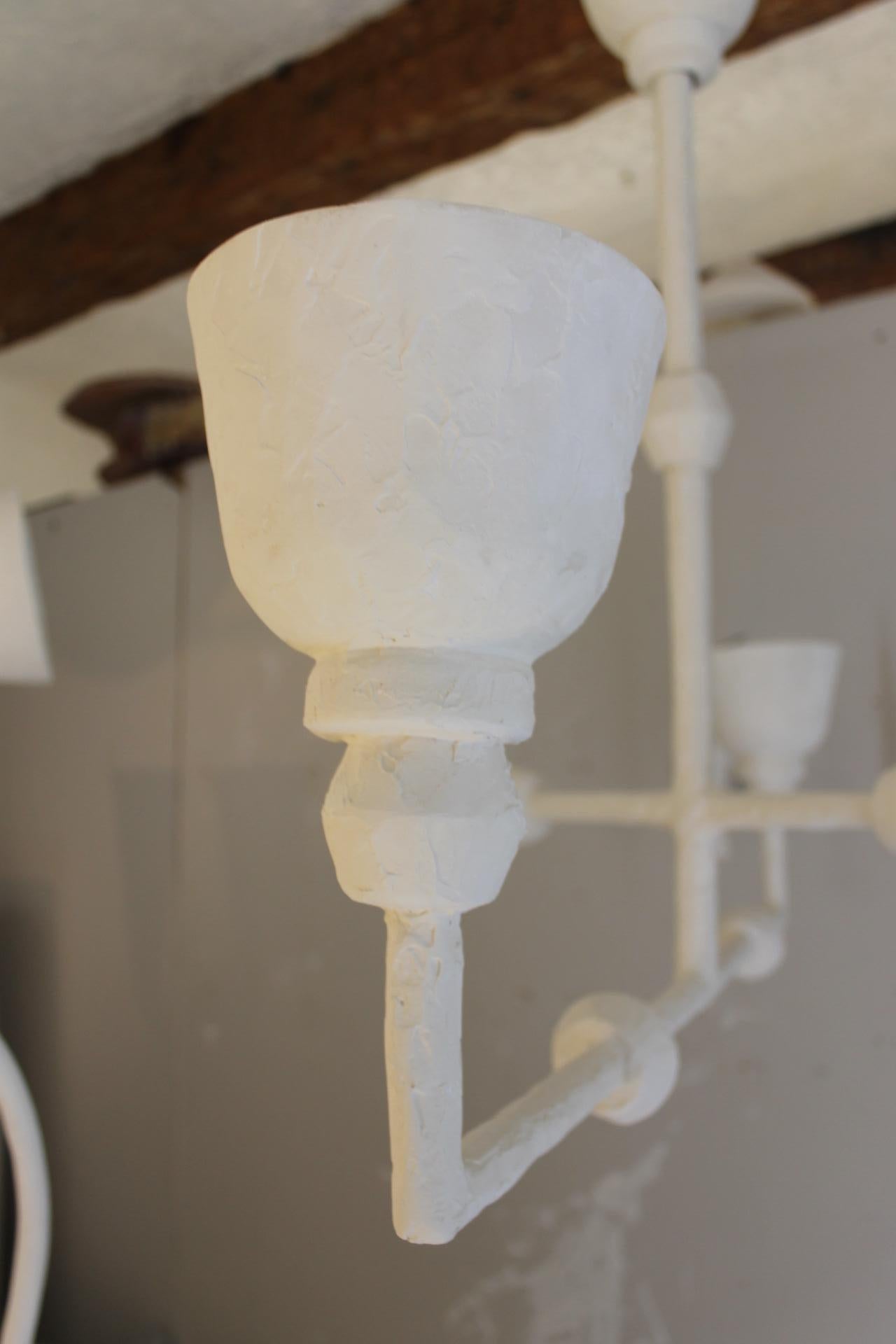 Hand-Crafted Plaster light, Giacometti style with four branches for pair For Sale
