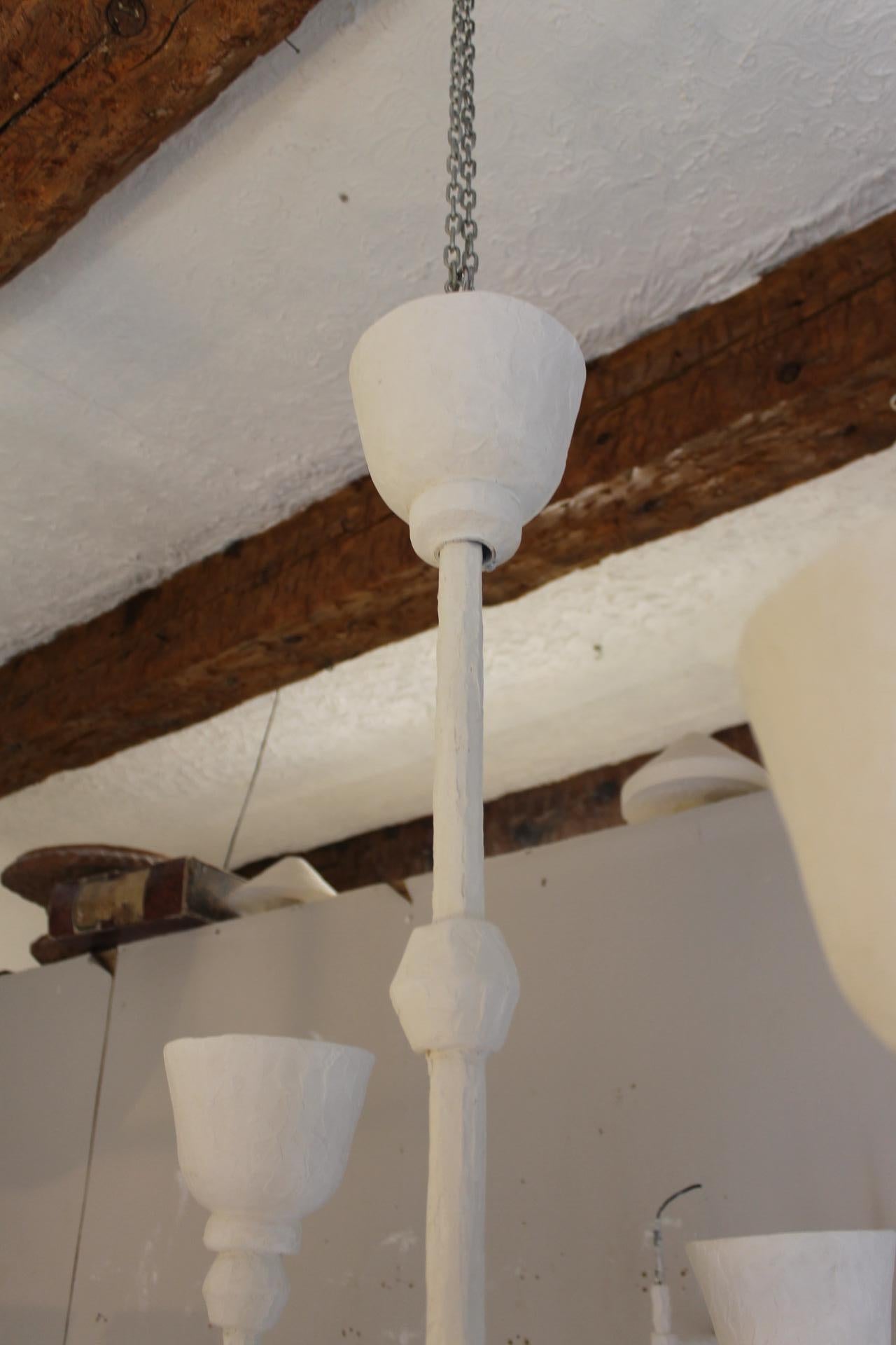 Plaster light, Giacometti style with four branches For Sale 1