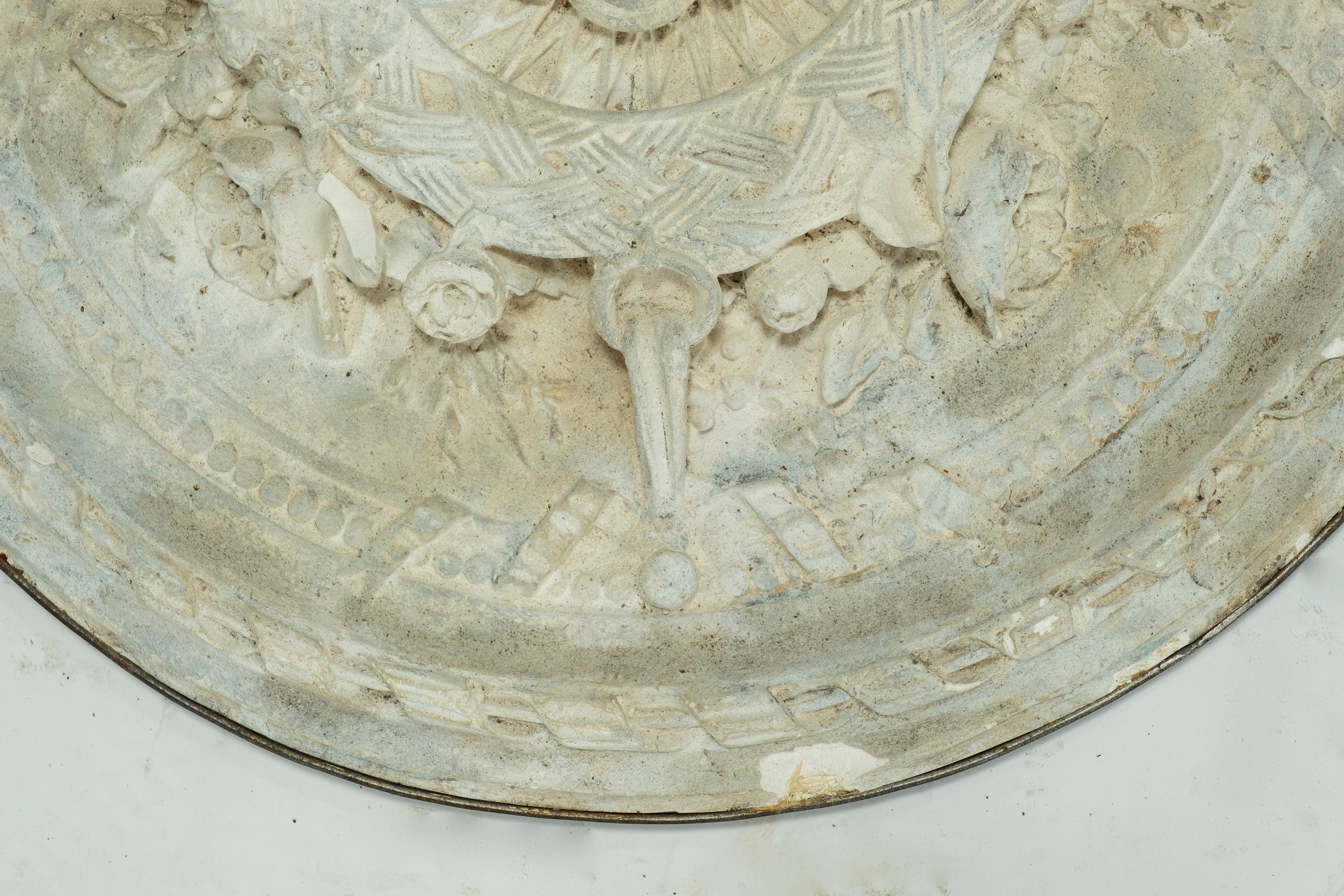 19th century Plaster Medaillion wrapped in iron.