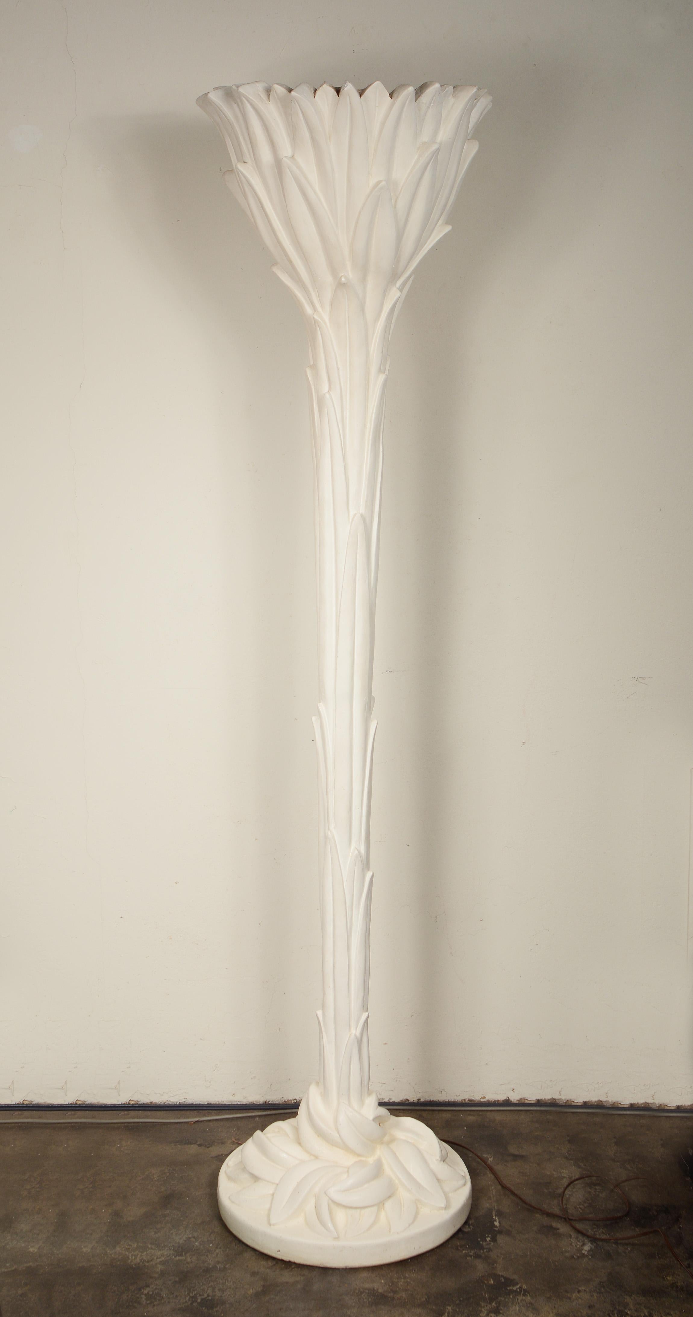 Plaster plant form floor lamp in the style of Serge Roche. This lamp has great fluid lines and is one the better proportioned of this style. The lamp has a couple of chips to the leaf tips on the top rim. One large one and a smaller one. A few of