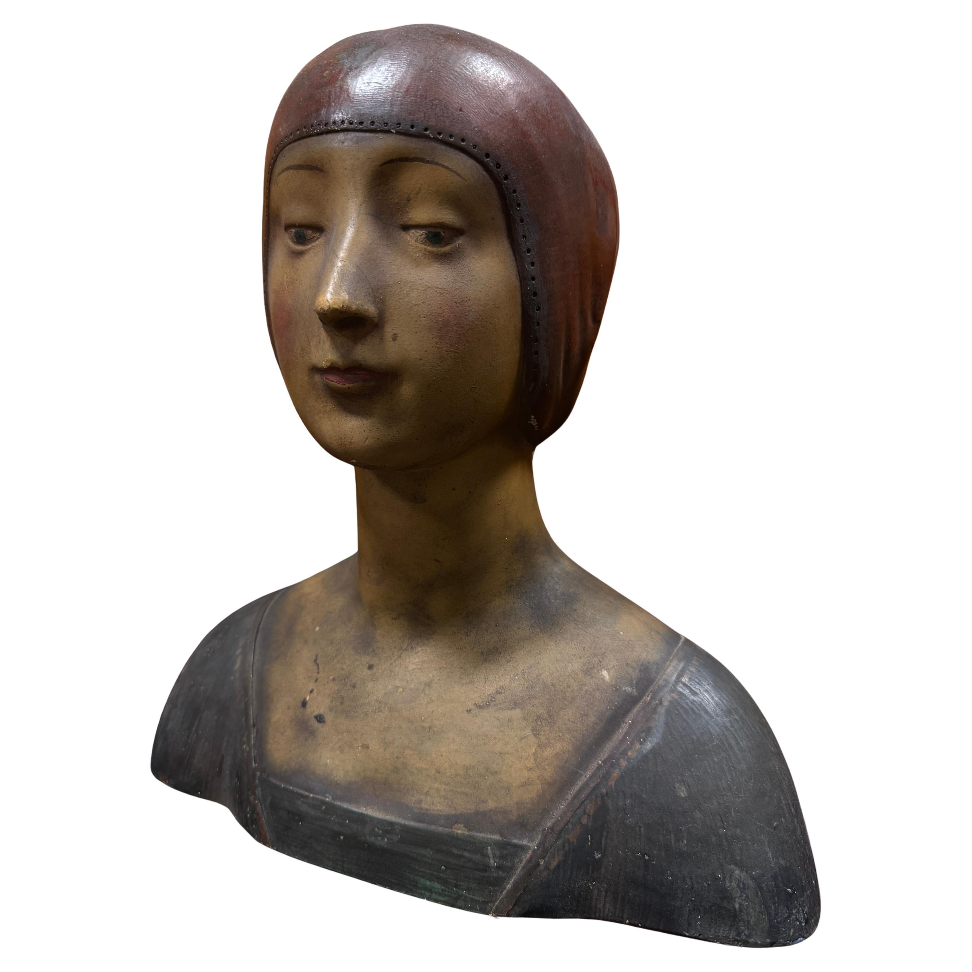 Possibly Beatrice, but likely a Grand Tour bust figure, painted plaster over wood. Marked 921 to verso. Barely a few losses to paint. Enchanting and remarkable bust of a young medieval woman.

Grand Tour busts were popular souvenirs for wealthy