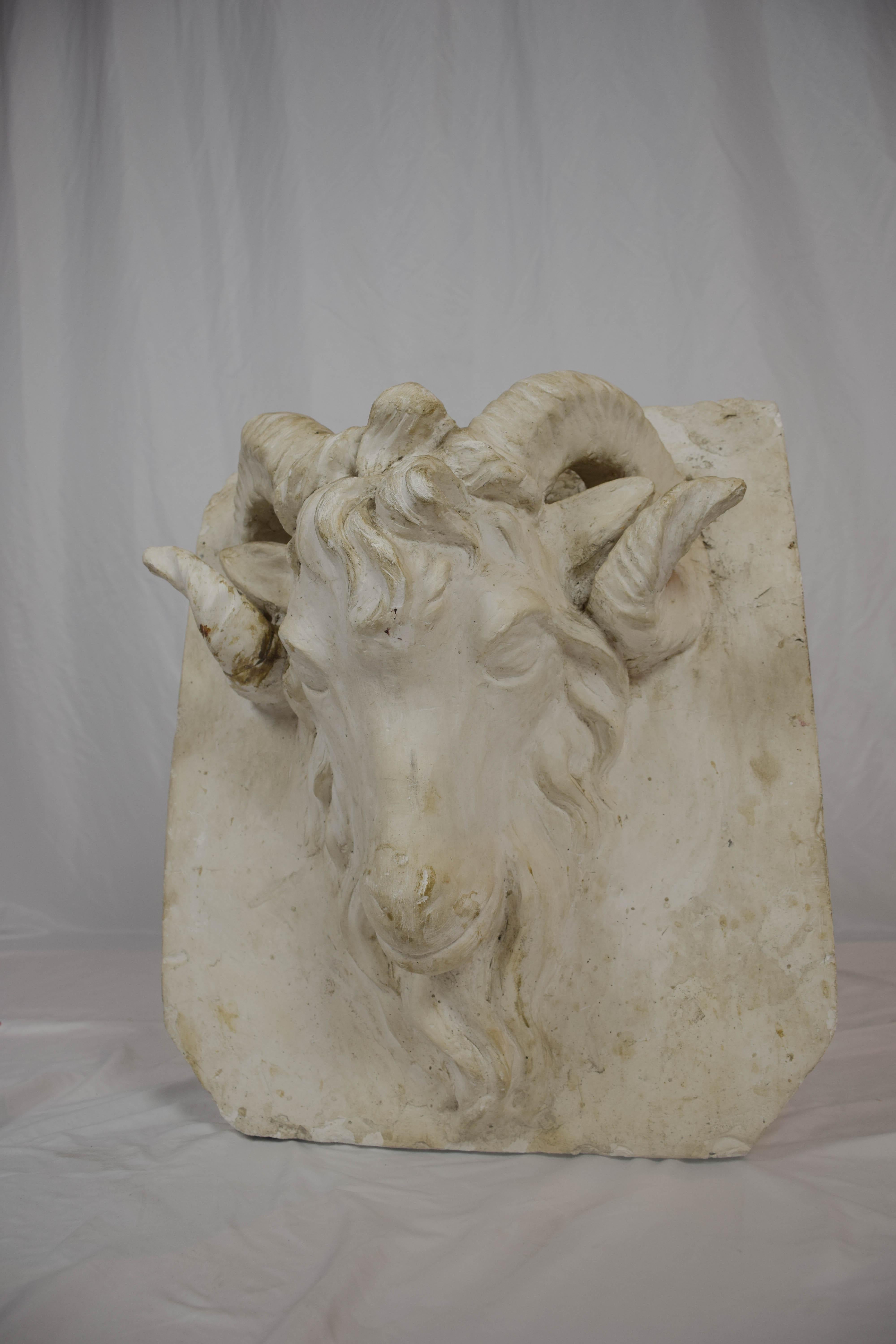 This wonderful plaster ram head figure was found in Southern France. The piece has incredible intricate detailing and is complete with unbroken horns and ears on either side of the rams face. The ram has been a long held symbol for determination,