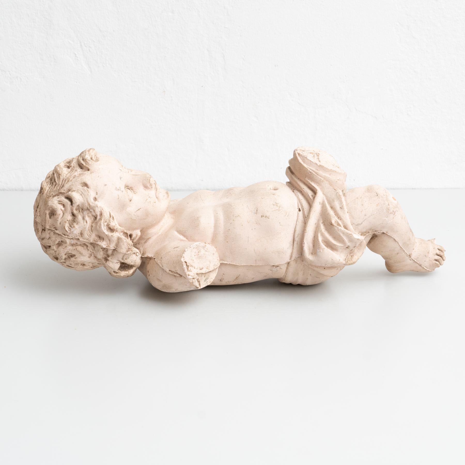 Traditional religious plaster figure of baby Jesus Christ.

Made in traditional Catalan atelier in Olot, Spain, circa 1950.

In original condition, with minor wear consistent with age and use, preserving a beautiful
