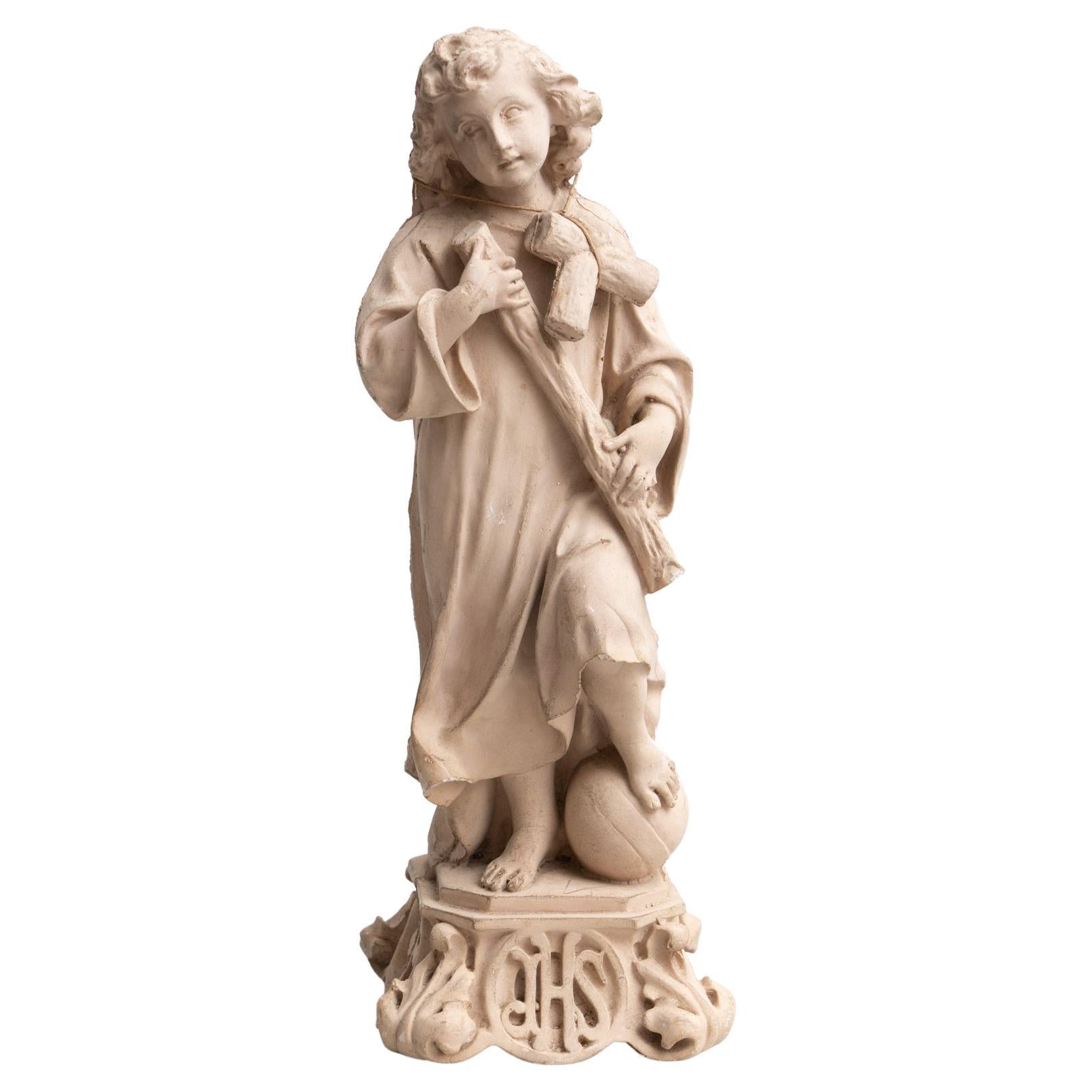 Figure traditionnelle religieuse en plâtre représentant le bébé Jésus-Christ, vers 1950 en vente