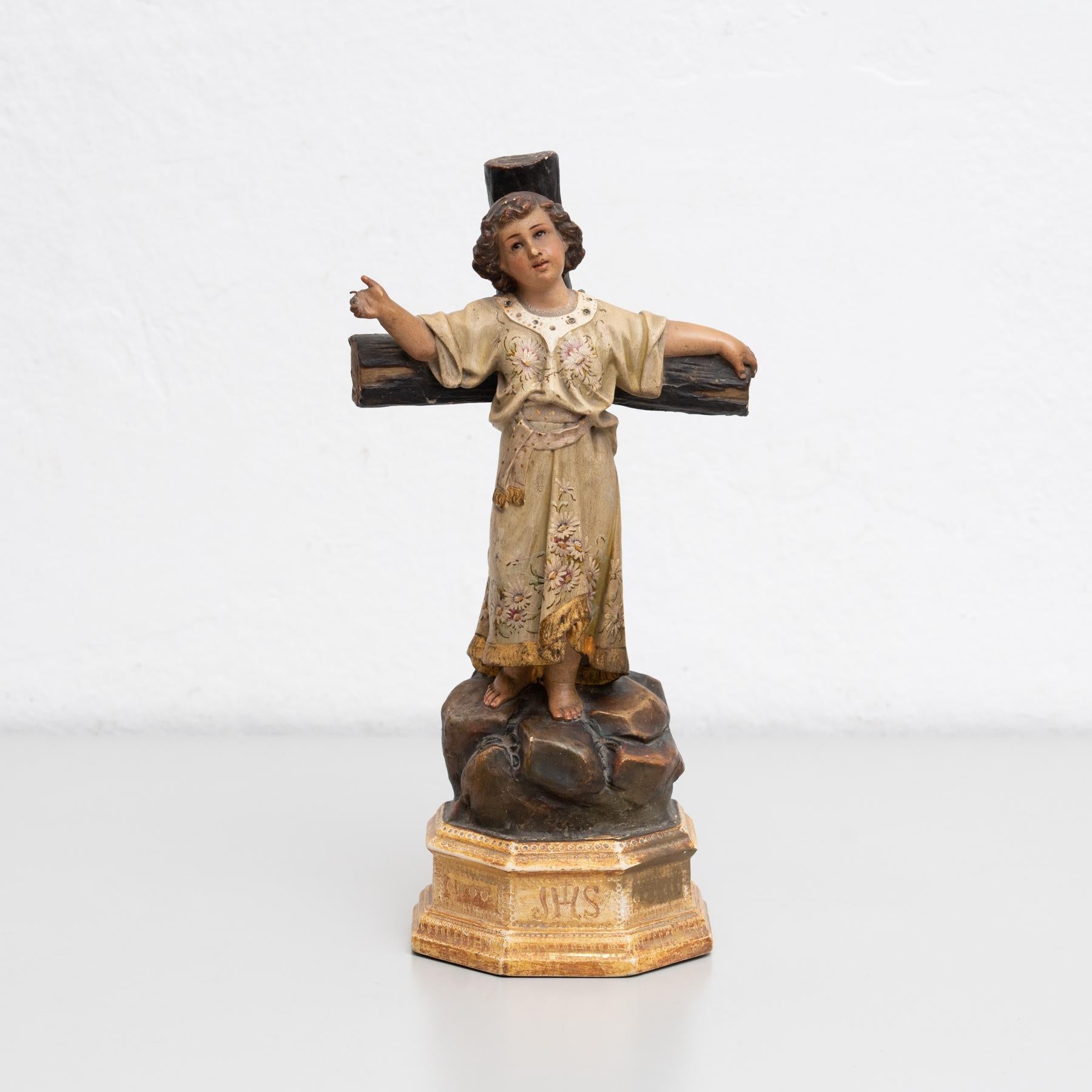 Traditional religious plaster figure of a baby Jesus.    Made in traditional Catalan atelier in Olot, Spain, circa 1930.    In original condition, with minor wear consistent with age and use, preserving a beautiful patina.    Materials:  Plaster.   