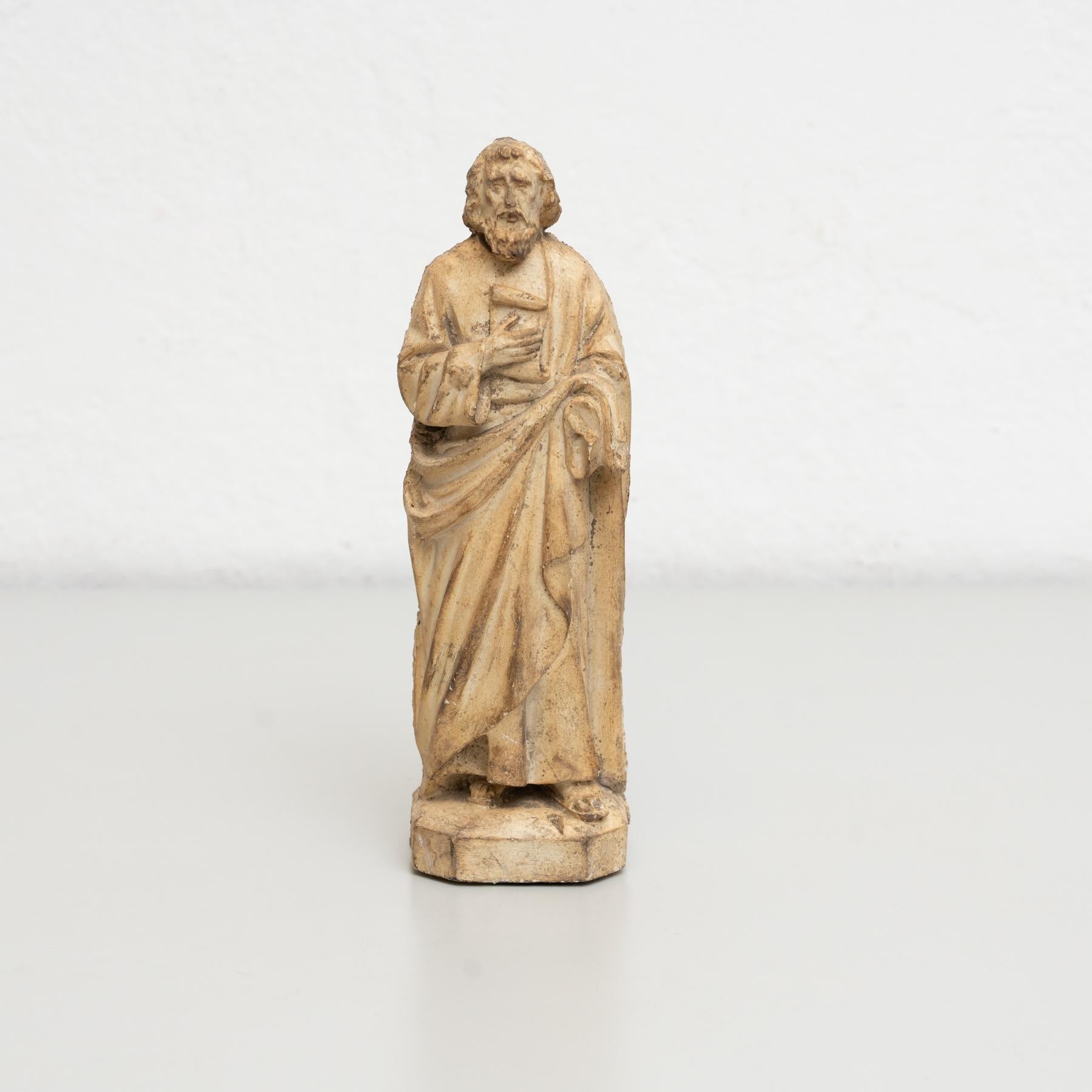 Traditional religious plaster figure of a saint.    Made in traditional Catalan atelier in Olot, Spain, circa 1950.    In original condition, with minor wear consistent with age and use, preserving a beautiful patina.    Materials:  Plaster.   