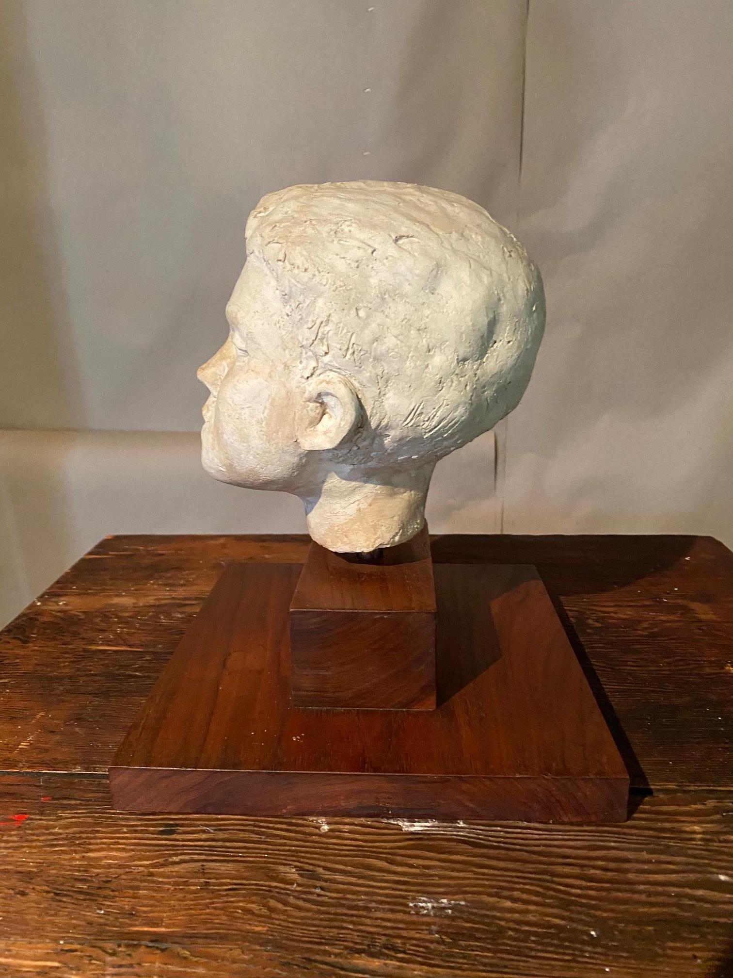 Early 20th Century Plaster Sculpture Bust of Young Boy For Sale