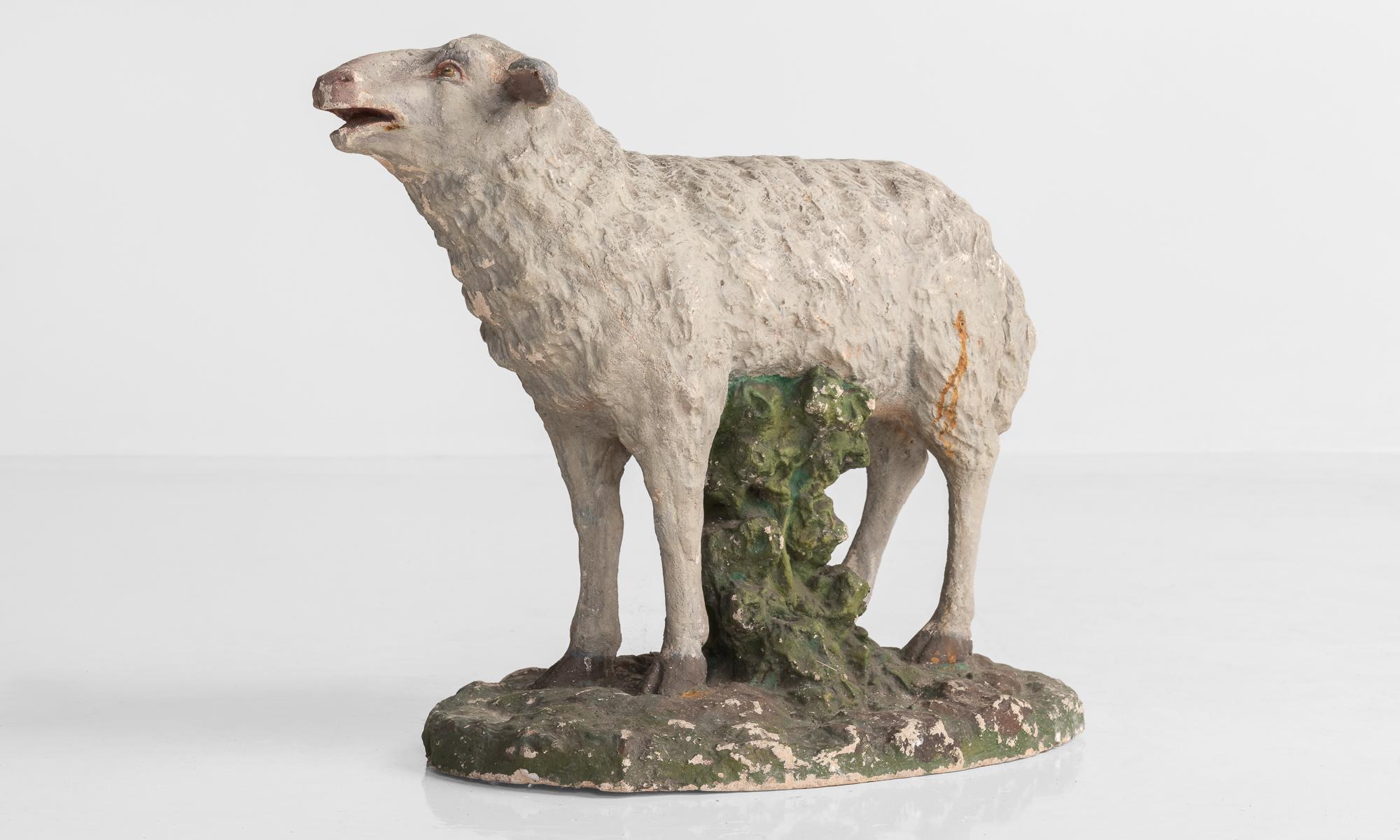 Plaster sculpture of sheep, circa 1950

Painted, playful sheep, cast in plaster.

Measures: 14