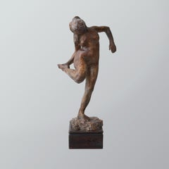 Plaster statue of a dancing woman looking at her foot, after Edgar Degas' statue