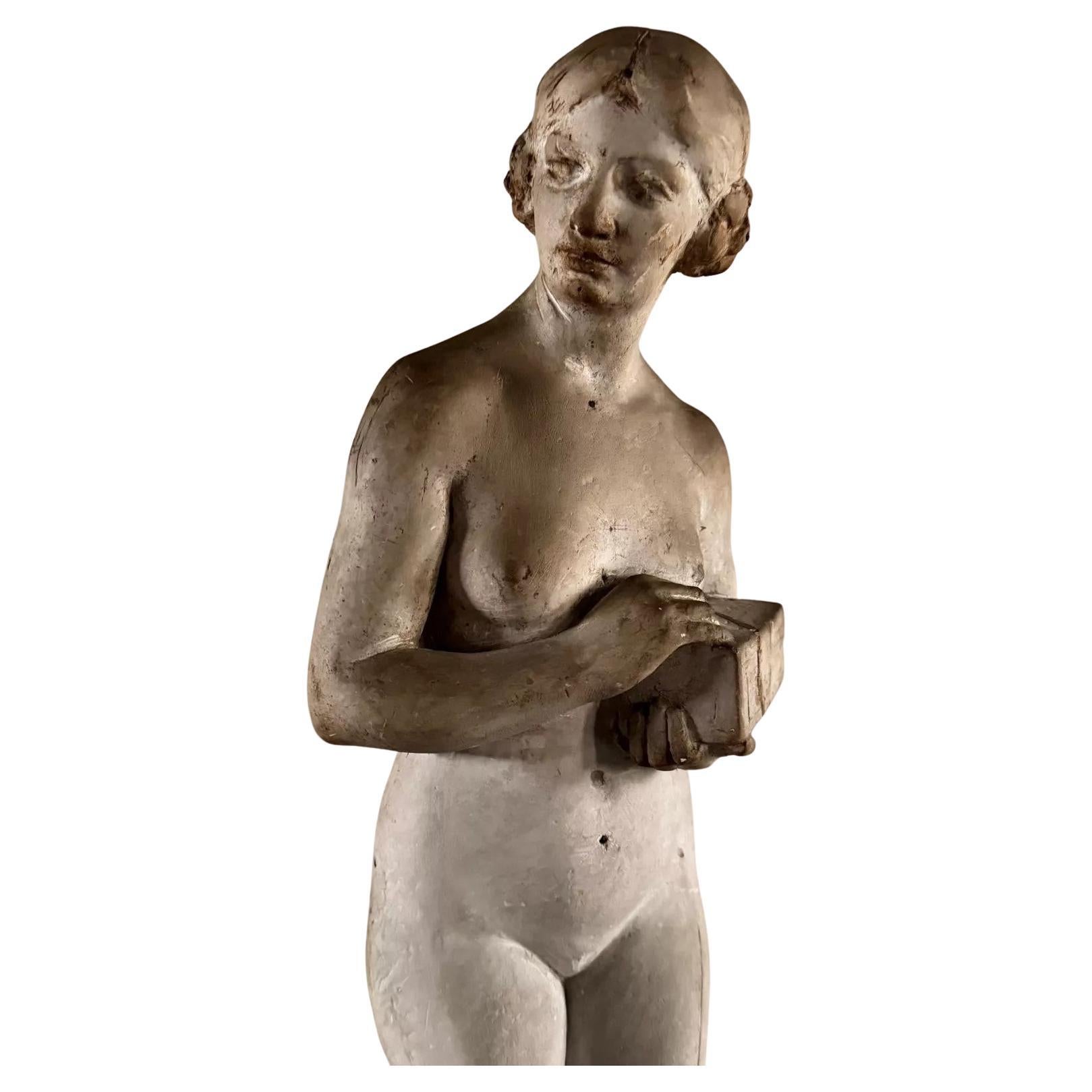 Plaster studio statue by Charles Filleul, female subject with box, 20th century