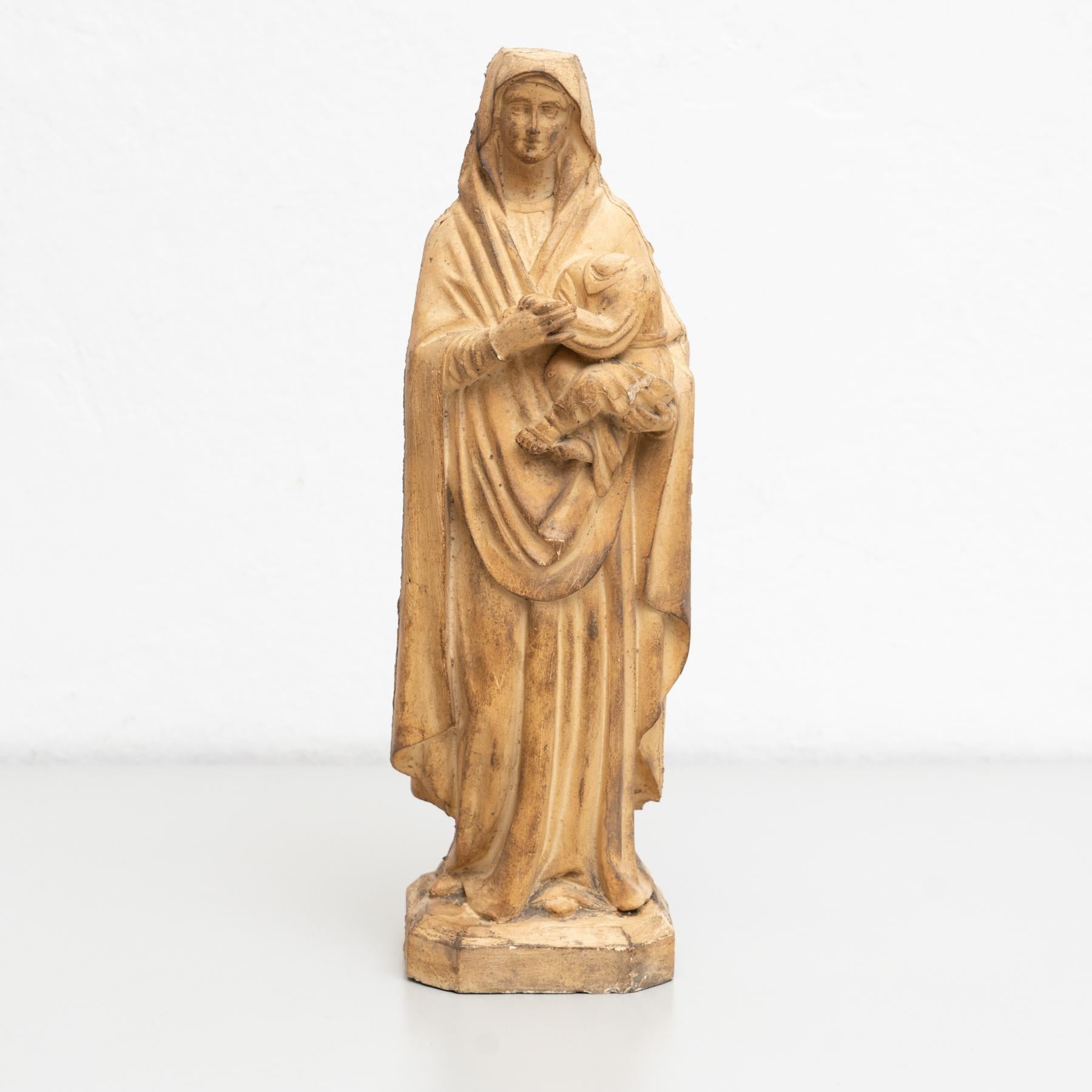 Traditional religious plaster figure of a virgin.  Made in traditional Catalan atelier in Olot, Spain, circa 1950.  In original condition, with minor wear consistent with age and use, preserving a beautiful patina.  Materials: Plaster.     