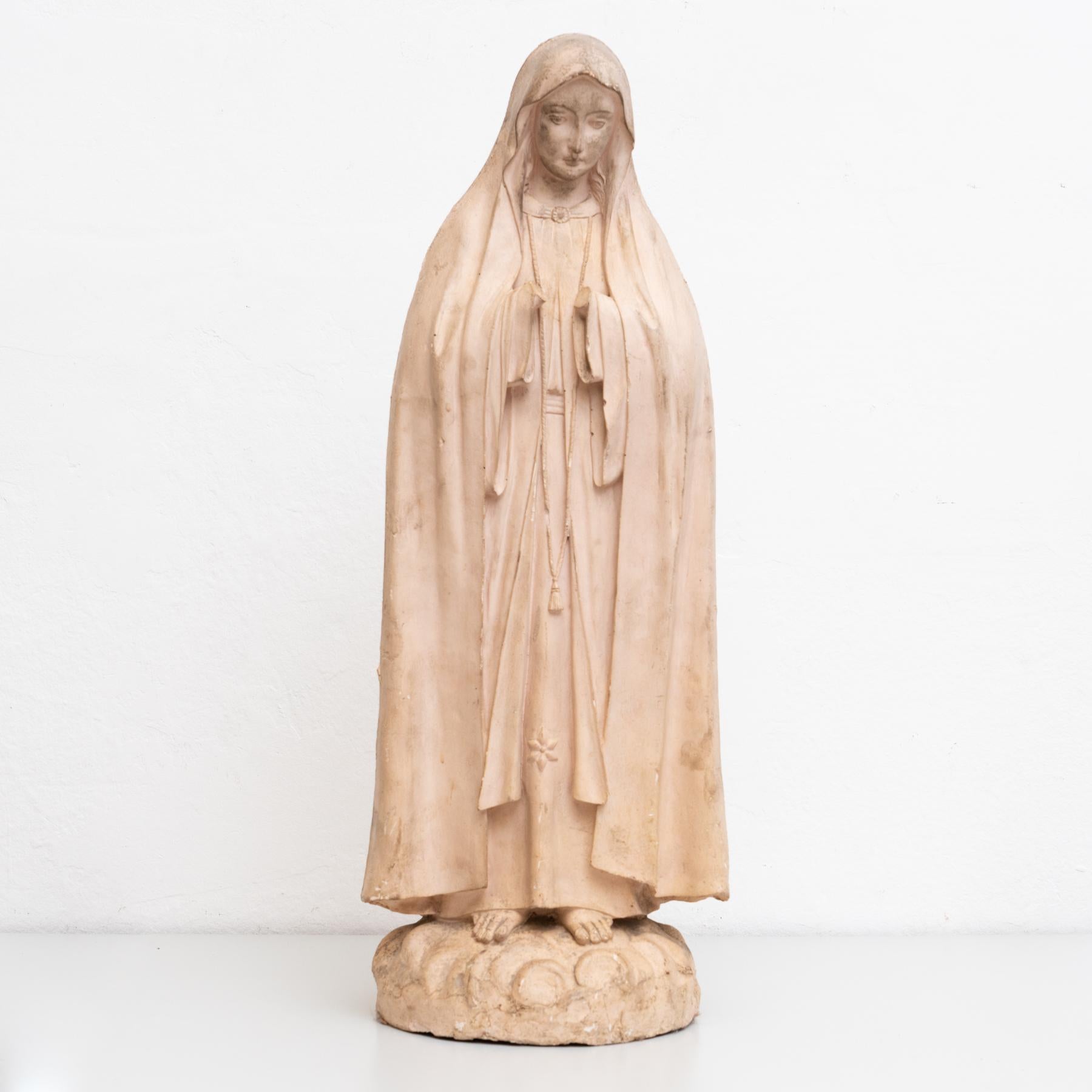 Traditional religious plaster figure of a virgin.

Made in traditional Catalan atelier in Olot, Spain, circa 1950.

In original condition, with minor wear consistent with age and use, preserving a beautiful patina.

Materials:
Plaster.
 