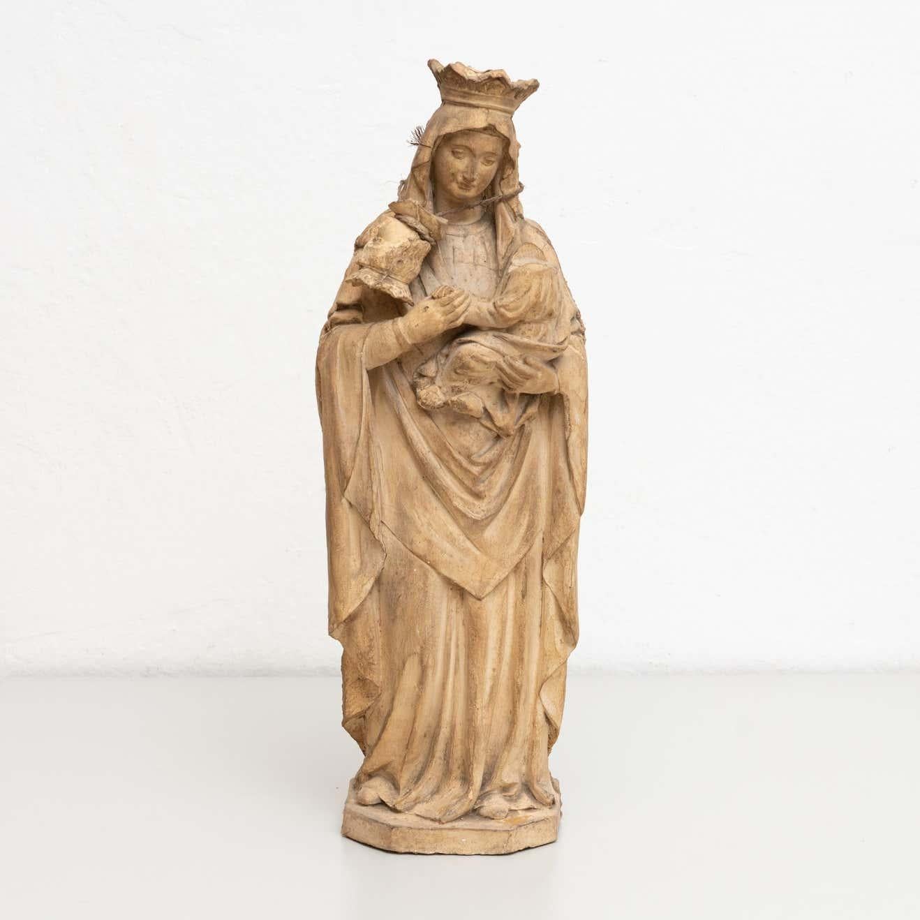 Traditional religious plaster figure of a virgin.

Made in traditional Catalan atelier in Olot, Spain, circa 1950.

In original condition, with minor wear consistent with age and use, preserving a beautiful patina.

Materials:
plaster.