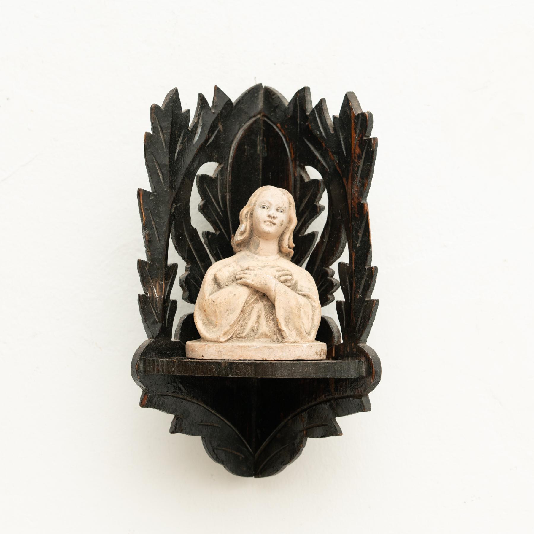 Traditional religious plaster figure of a virgin in a wooden altar.    Made in traditional Catalan atelier in Olot, Spain, circa 1950.    In original condition, with minor wear consistent with age and use, preserving a beautiful patina.   