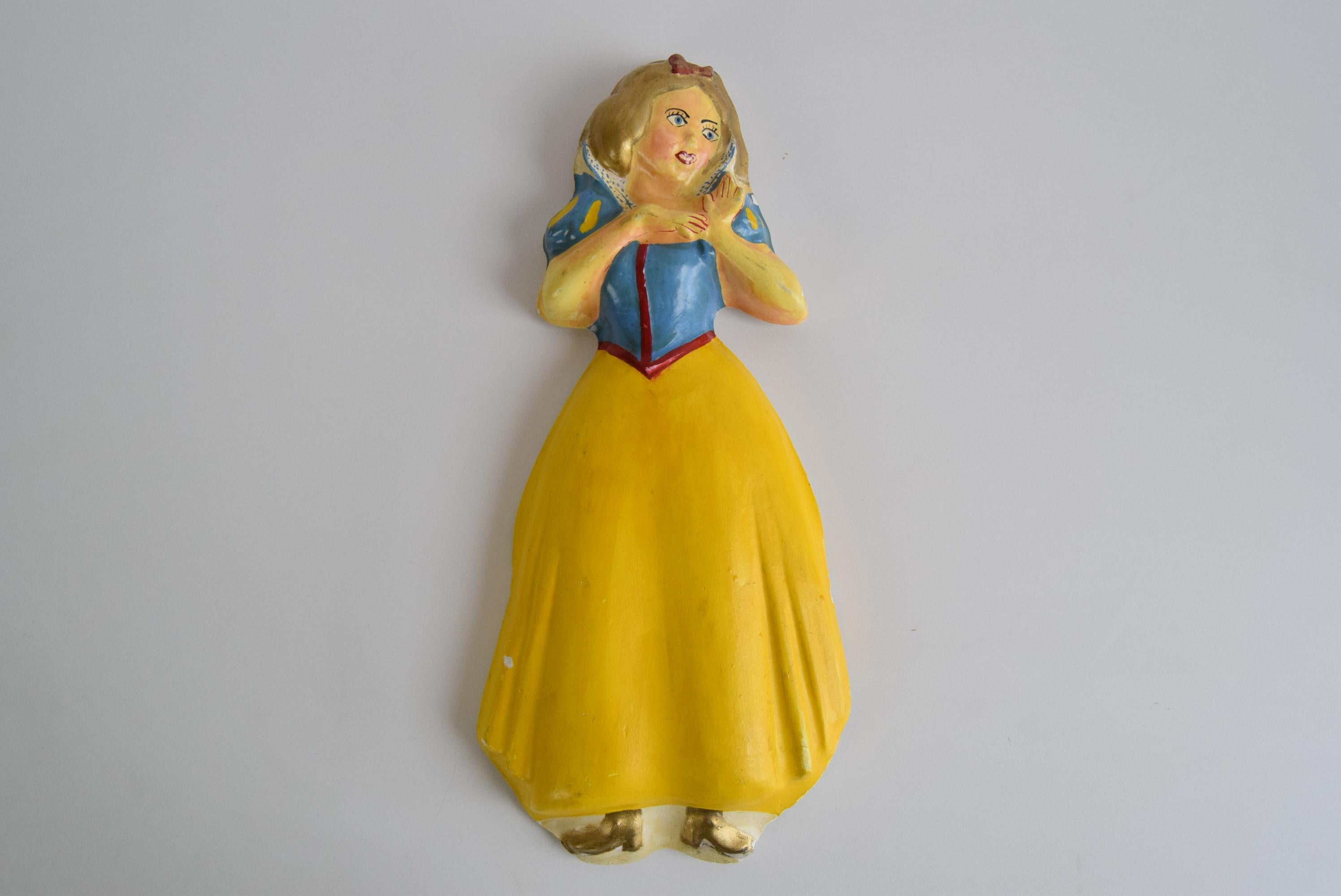 
The wall sculpture of the Snow Maiden, made of plaster, bears signs of use and is damaged in some places (see photo)
Original condition