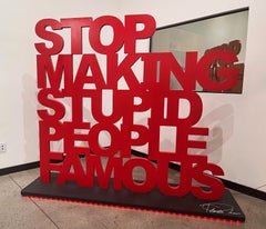 "Stop Making Stupid People Famous" large wood with polyurethane insallation