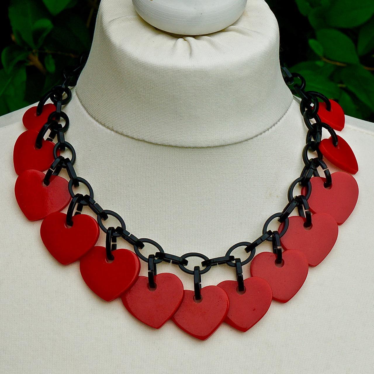 Marion Godart fantastic plastic red heart drops and black link chain necklace, with a hook clasp. The necklace is length 53cm / 20.8 inches. The necklace is in very good condition.

This is a stylish and fun statement necklace from Paris.