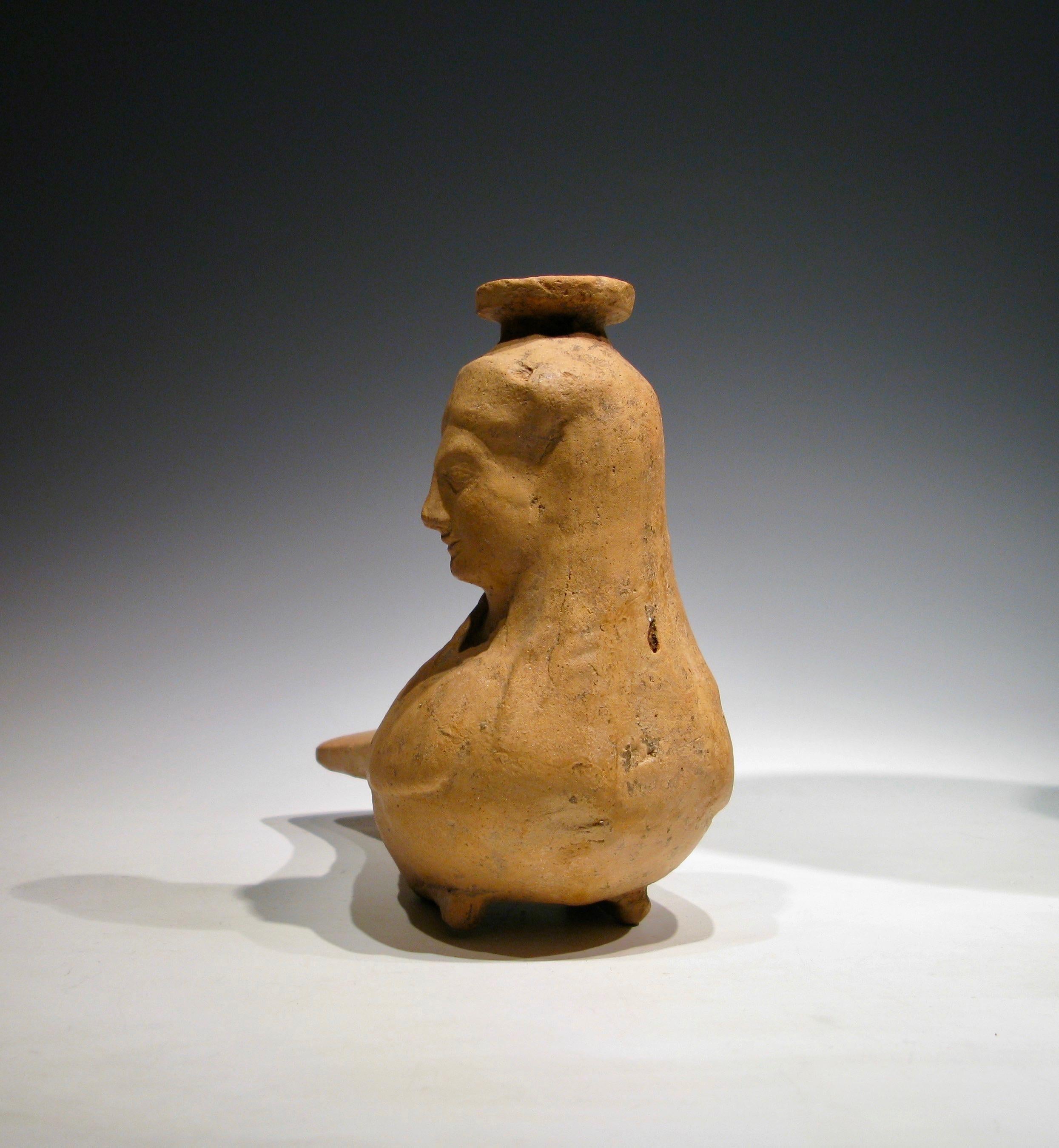 Classical Greek Plastic Terracotta Vase in Form of a Siren. Eastern Greek, circa 530 BC For Sale