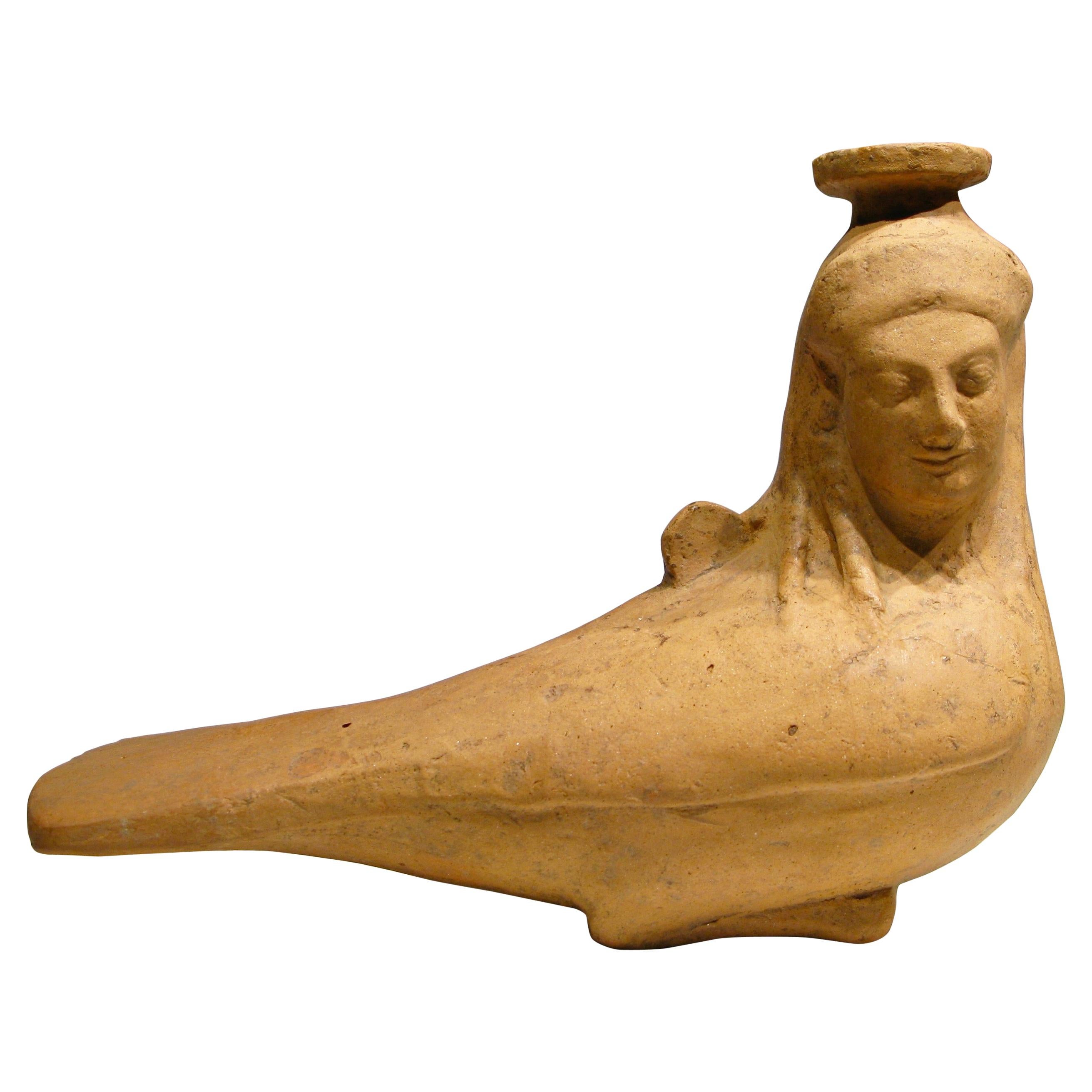 Plastic Terracotta Vase in Form of a Siren. Eastern Greek, circa 530 BC For Sale