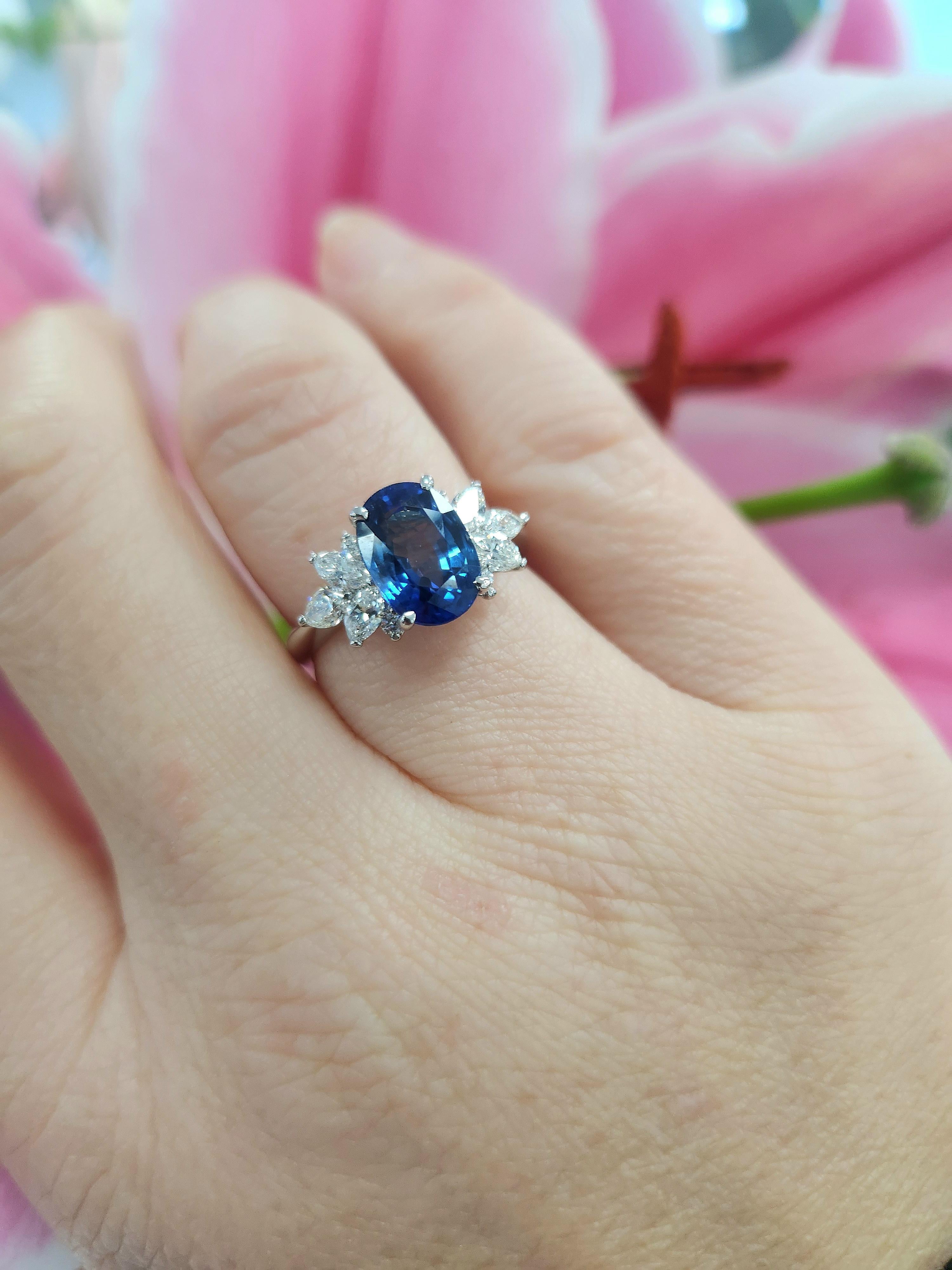 Artisan Plat 2.70 Carat Oval Blue Sapphire Ring with Marquise & Pear Diamond Accents
