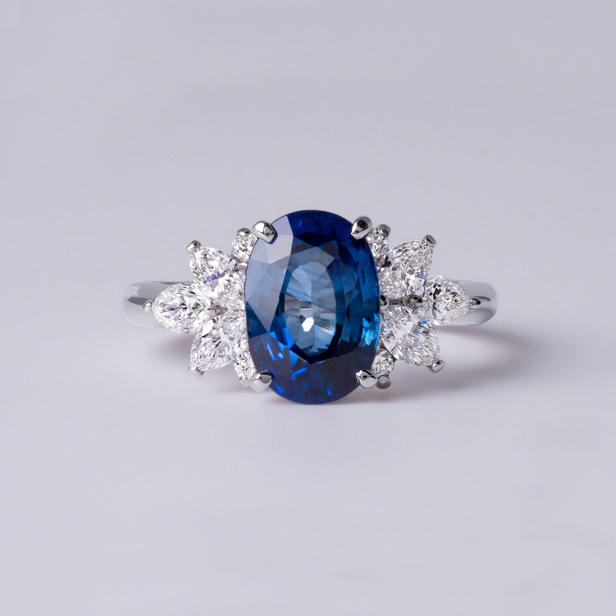 Plat 2.70 Carat Oval Blue Sapphire Ring with Marquise & Pear Diamond Accents 1