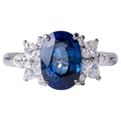 Plat 2.70 Carat Oval Blue Sapphire Ring with Marquise & Pear Diamond Accents