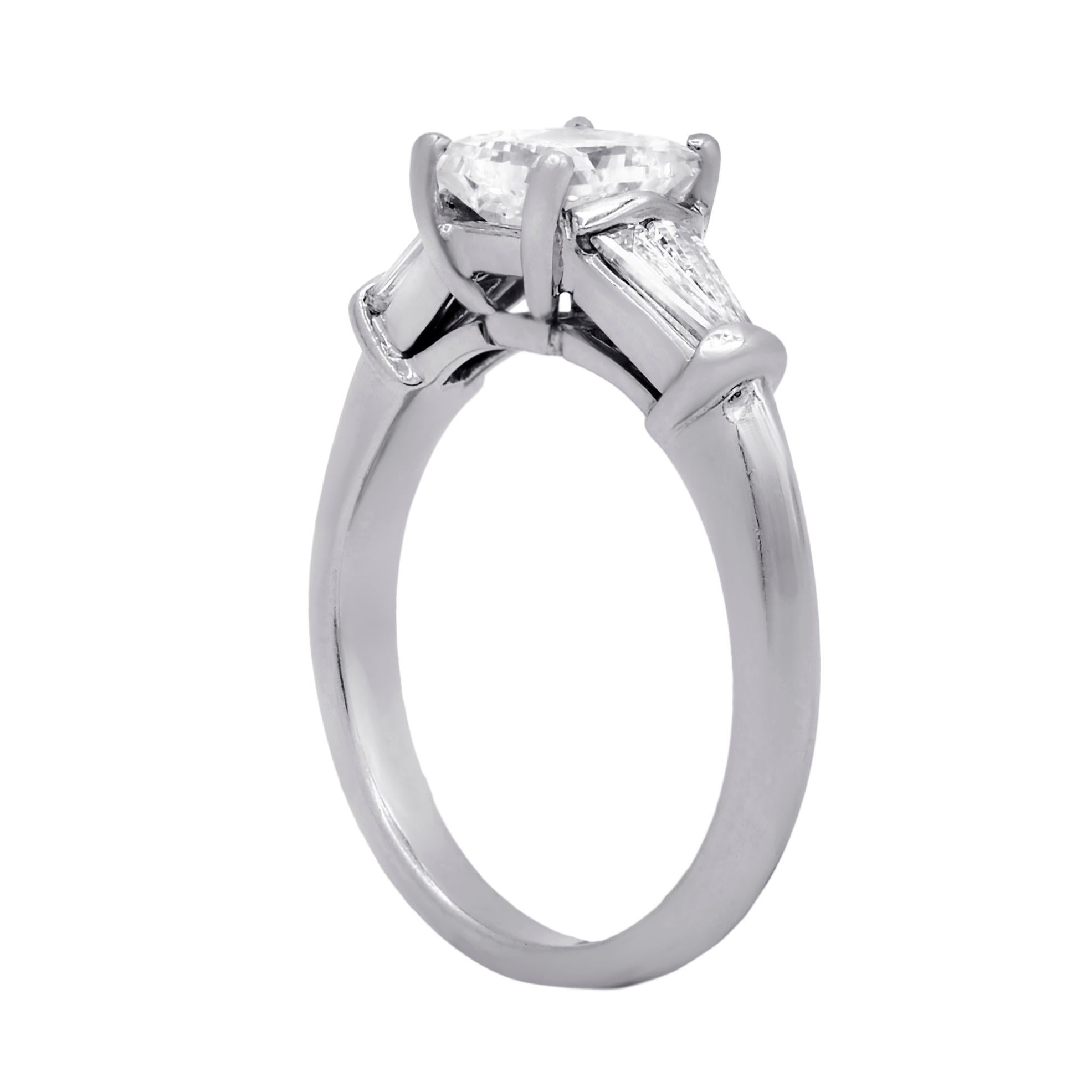 Plat princess cut engagement ring with center gia certified princess diamond (prc772) 1.01 I-vs2 set with 2 baguette  diamonds in lucida setting.
