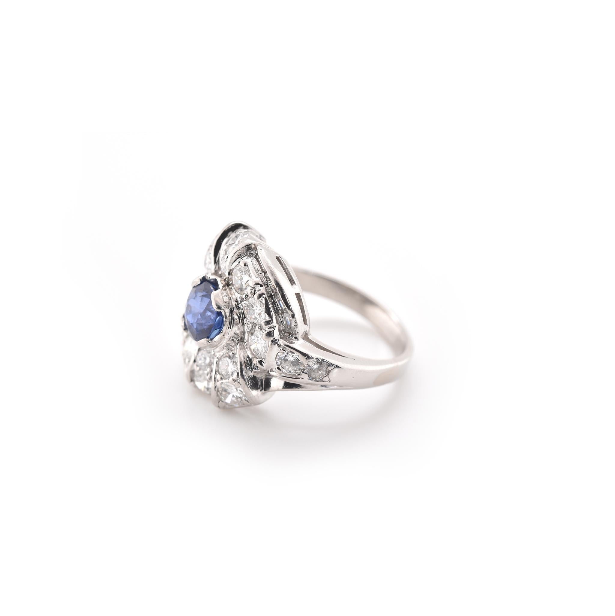 Material: Platinum
Sapphire: 1 round sapphire = 1.00ct
Diamonds: 18 round brilliant cuts = 1.17cttw
Color: F-G
Clarity: VS1-VS2
Diamonds: 8 Baguette cuts = 0.16cttw
Color: F-G
Clarity: VS1-VS2
Ring Size: 5 ½ (allow up to two additional business days