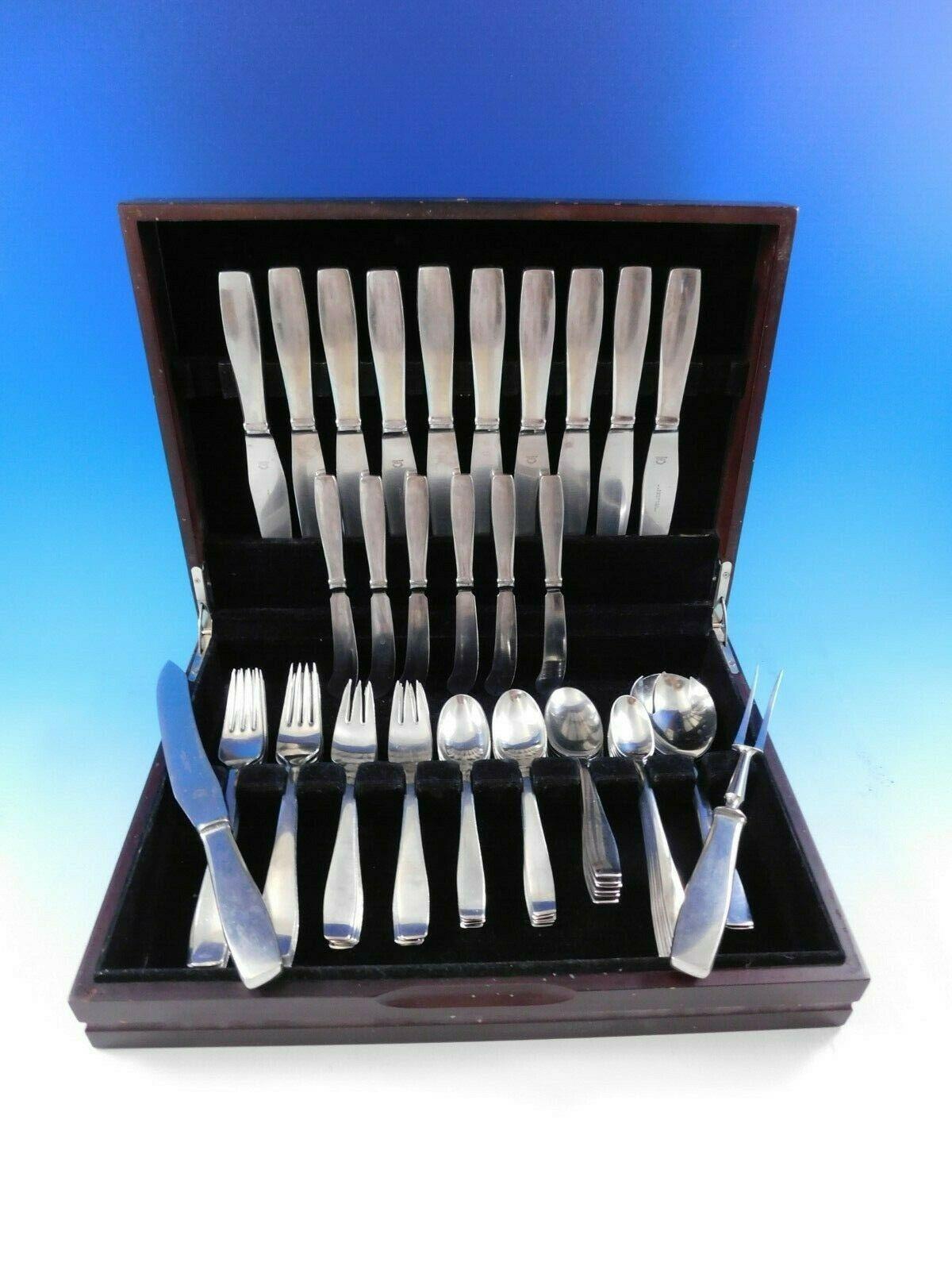Georg Jensen stainless steel 

Estate Mid-Century Modern style Plata by Georg Jensen stainless flatware set - 62 pieces. This set includes:

10 dinner knives, 9 1/4