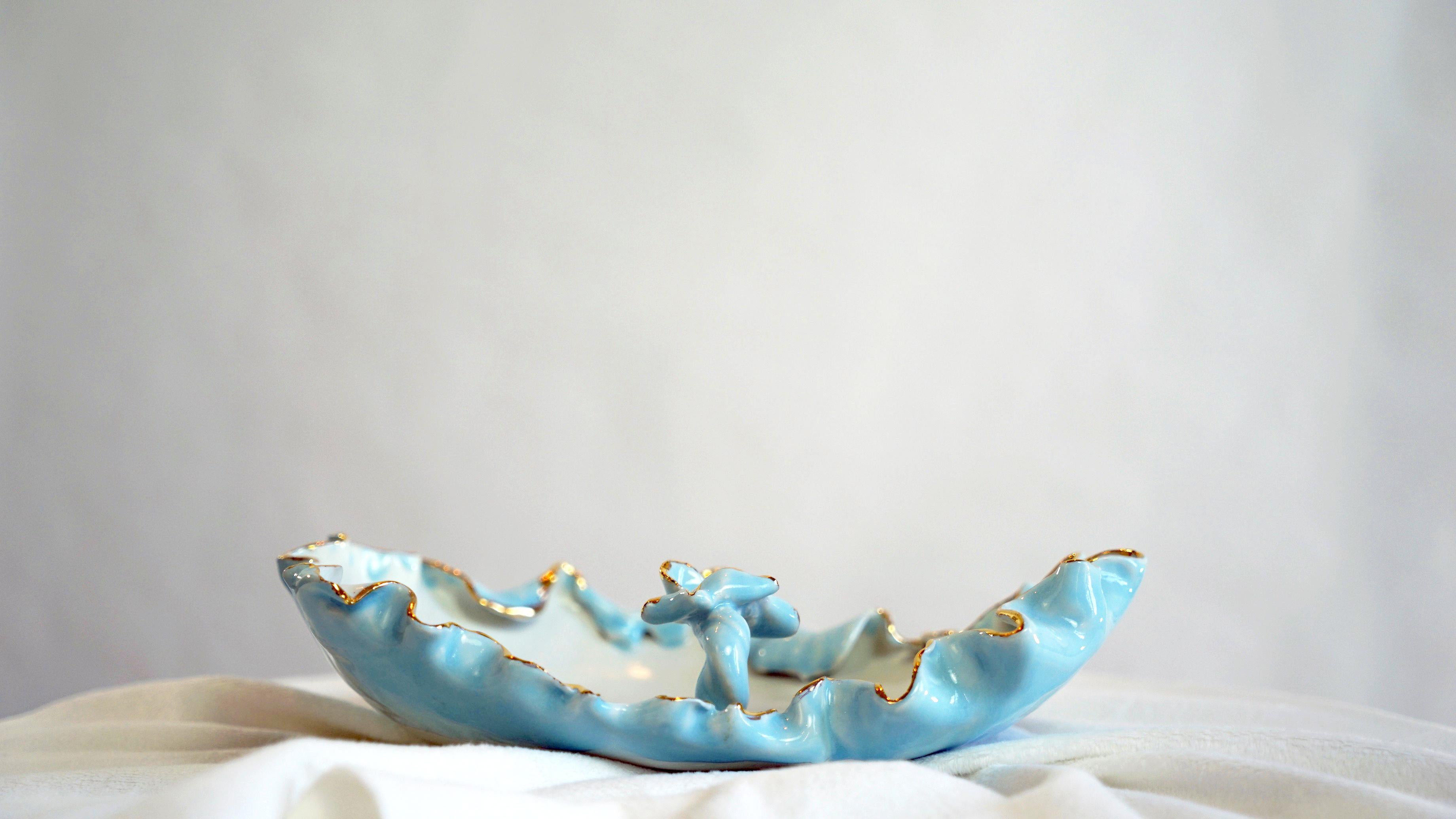 This is a numbered piece in fine porcelain designed and hand built by artist - designer Hania Jneid. Unique piece hand glazed and ornamented in Gold lustre. It is functional as well as sculptural. It is an value added to any space as a sculptural