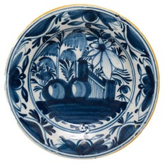 Assiette en faïence de Delft bleu, blanc et jaune, diamètre 23 cm, paysage de chinoiseries