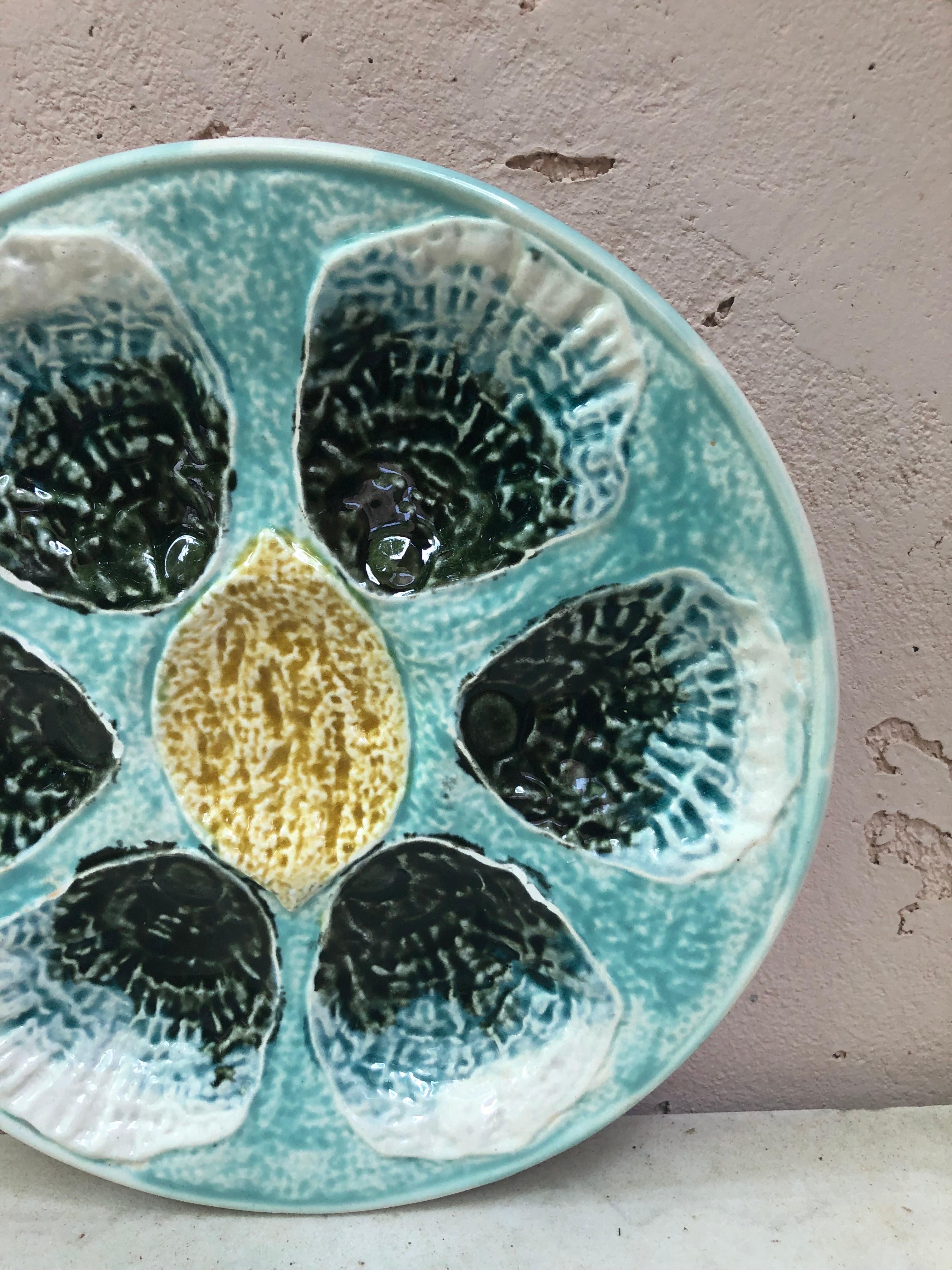 French Majolica oyster plate with lemon, Circa 1890.